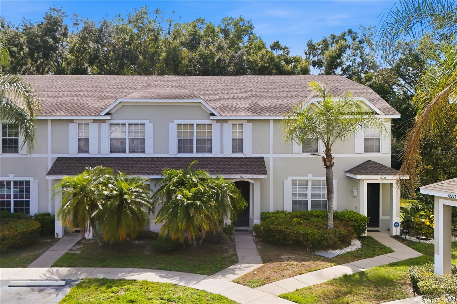 One or more photo(s) has been virtually staged. Welcome to this beautifully maintained 2-bedroom, 2.5-bath townhome tucked away in a charming community just off Gunn Highway, where comfort, convenience, and flexibility come together. Featuring two spacious primary suites, each with its own private bathroom and walk-in closet, this thoughtfully designed floor plan is ideal for homeowners, roommates, remote workers, or investors seeking a highly desirable rental opportunity.

Upon entering, you'll find a versatile bonus space perfect for a home office, formal dining area, sitting room, or additional living space. The home then opens into a spacious kitchen overlooking the family room, creating a comfortable layout for both everyday living and entertaining. A convenient half bath, large pantry closet, and abundant storage throughout the first floor add to the home's functionality.

Upstairs, both bedrooms enjoy large windows that fill the space with natural light, while additional linen and storage closets provide even more room for organization. The backyard overlooks a tranquil pond and natural vegetation, offering a peaceful backdrop for your morning coffee or a relaxing place to unwind at the end of the day.

Conveniently located near shopping, dining, parks, schools, medical facilities, and entertainment, this home also offers quick access to Gunn Highway and the Veterans Expressway, making it easy to reach Tampa International Airport, Downtown Tampa, and surrounding areas. Whether you're searching for your next home or a smart investment opportunity, this townhome offers a versatile layout, peaceful views, and an exceptional location that make it easy to love.