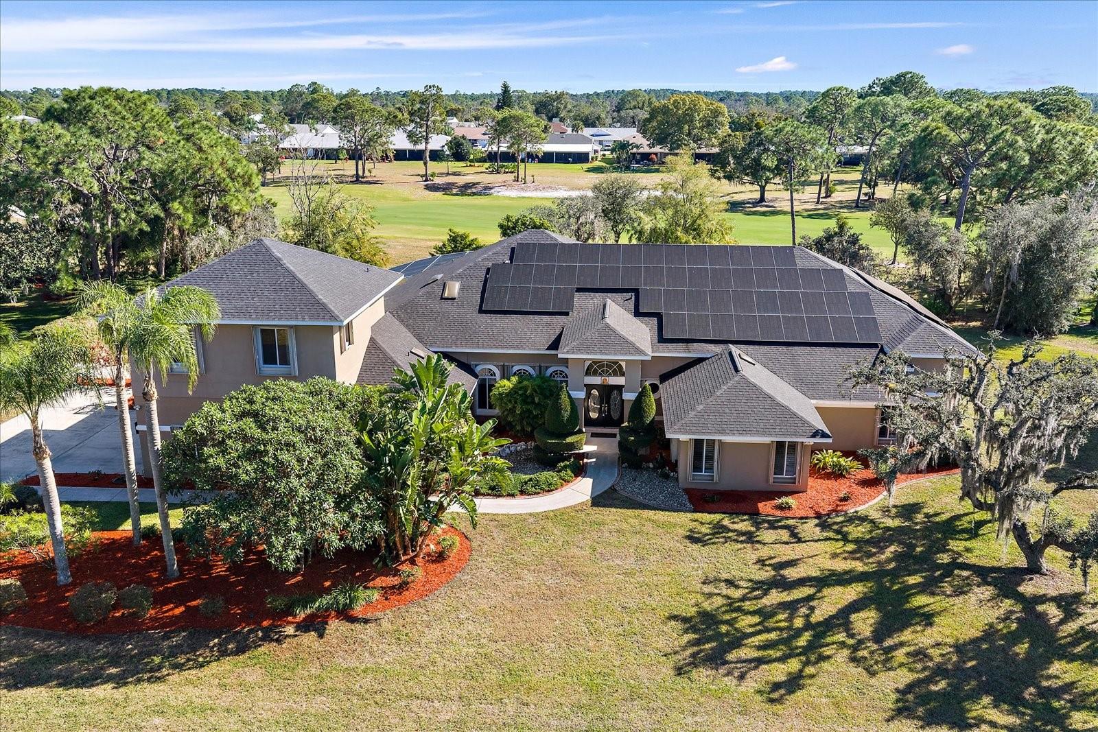 Experience luxury golf-course living in this extraordinary custom estate located in the highly sought-after Sun ‘n Lake community of Sebring. Perfectly positioned on an oversized 0.70-acre homesite overlooking the golf course, this impressive two-story residence offers more than 5,900 square feet of heated living space and over 8,500 square feet under roof, delivering an exceptional blend of elegance, comfort, and functionality. Adding to its value, the home features a seller-owned solar energy system with no lease, providing outstanding energy efficiency and long-term savings.
Designed for both grand entertaining and everyday living, this 5-bedroom, 4.5-bath residence showcases soaring vaulted ceilings, skylights, abundant natural light, and beautiful wood and tile flooring throughout. The chef-inspired kitchen is a culinary dream, featuring stone countertops, built-in and convection ovens, cooktop, wine refrigerator, trash compactor, and extensive cabinetry and prep space. Multiple living and dining areas, a wet bar, and central vacuum system further enhance the home's luxurious appeal.
The expansive first-floor primary suite offers a private sanctuary with spacious walk-in closets and serene golf course views. Generously sized secondary bedrooms provide flexibility for family, guests, home offices, or multigenerational living.
Step outside to your own resort-style oasis featuring a heated in-ground pool, outdoor kitchen, outdoor shower, beautifully landscaped grounds, garden areas, and breathtaking golf course vistas. Whether enjoying a quiet evening by the pool or hosting large gatherings, this outdoor space is designed to impress.
Additional premium features include a whole-home generator, hurricane shutters, irrigation system with private well, abundant storage, balcony, private entrance, and attached 2-car garage. Located within a deed-restricted golf community with optional amenities including a fitness center and community pool, and an incredibly low HOA fee of only $25 annually.
Conveniently located near shopping, dining, medical facilities, and recreational opportunities, this one-of-a-kind estate offers the perfect combination of luxury, privacy, energy efficiency, and resort-style living. A truly rare opportunity to own one of Sebring's premier golf-course homes.
