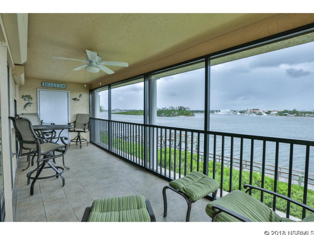 VIEWS VIEWS VIEWS!!!  Direct Riverfront with endless views!  The NSB Lifestyle you have searching for is NOW available!  This TOP floor END unit with INCREDIBLE views is turn key.  Meticulously kept and ready for your touches and enjoyment. BONUS!! Extra storage in the master bed attic.  Watch the boats parade by all day and night.  Tie your boat up on one of the dock slips or dry storage.  2 heated pools, tennis, chip and putt golf, boat ramp, exercise facility and clubhouse!  NEW roof being installed NO assessments as of 7.24.18 ;LocationDescription: Condo ;Water: City
