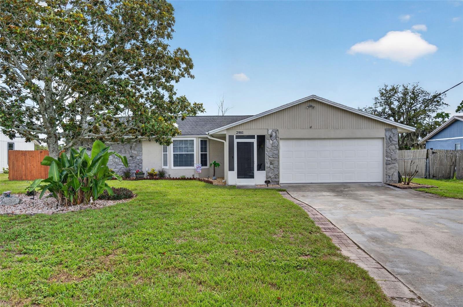 Move-in ready and full of charm, this well maintained, 3 bedroom / 2 bath  home features an updated kitchen along with wood laminate flooring, and a new HVAC system installed in 2023. The open and inviting living spaces offer a comfortable layout that’s perfect for everyday living. Ideally situated approximately 35 minutes from Daytona Beach and 45 minutes from Downtown Orlando, offering convenient access to world-class entertainment, dining, shopping, and Florida’s beautiful Atlantic coastline.
Out back, you’ll enjoy a peaceful setting with water views and no rear neighbors, creating the perfect place to relax, entertain, or simply enjoy the Florida lifestyle. Whether you’re looking for your first home, downsizing, or adding to your investment portfolio, this property is one you don't want to miss!