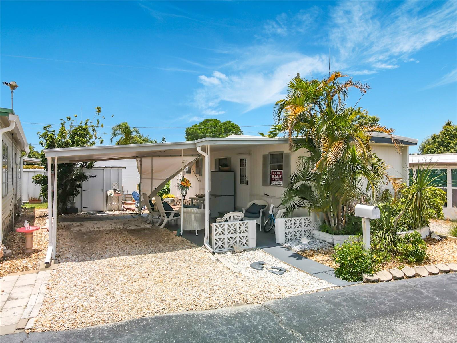 ***FULLY FURNISHED, FULLY REMODELED, ONLY $100 MONTH HOA BEST DEAL IN PINELLAS COUNTY*** Welcome to affordable Florida living at its finest in the highly desirable Suncoast Manor community! This beautifully remodeled home is truly move-in ready and comes FULLY FURNISHED — just bring your suitcase and start enjoying the Florida lifestyle. One of the rare highlights of this community: YOU OWN THE LAND! Say goodbye to expensive monthly lot rent — enjoy incredibly low monthly fees of only $100, making this one of the best values in Pinellas County. Step inside to find a fully updated interior featuring modern finishes, stylish furnishings, and a bright open feel throughout. Major upgrades have already been completed, including a BRAND NEW A/C system and a newly installed roof featuring a lifetime guarantee through Comfort Cover Systems, giving the new owner peace of mind for years to come. Need storage? This property has you covered with THREE separate storage sheds — perfect for beach gear, bikes, tools, and more. Located just minutes from some of Florida’s top-rated Gulf beaches, shopping, dining, entertainment, and everything St. Petersburg has to offer. Whether you’re looking for a full-time residence, seasonal getaway, or affordable piece of paradise, this home checks all the boxes. Fully remodeled. Fully furnished. You own the land. Low fees. Minutes from the beach. Don’t miss this rare opportunity!