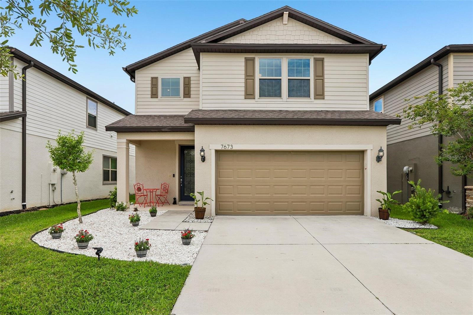 Welcome to this beautifully maintained 4-bedroom, 3-bathroom home located in the highly desirable Epperson Ranch community. Built in 2019, this spacious two-story residence has over 2,170 square feet of thoughtfully designed living space with an open-concept floor plan for both everyday living and entertaining.

The gourmet kitchen features granite countertops, stainless steel appliances, subway tile backsplash, custom cabinetry, and a large center island overlooking the kitchen. A first-floor bedroom and full bath provide flexibility for guests, a home office, or multigenerational living.

Upstairs, enjoy a versatile loft area for a media room, playroom, or work-from-home setup, along with a spacious owner's suite featuring dual vanities, a large walk-in closet, and an oversized walk-in shower. Additional upgrades include vinyl plank flooring both downstairs and upstairs, epoxy garage flooring, custom storage shelving, upstairs laundry, and a fenced in private conservation-view backyard with a brick paver patio for relaxing or entertaining outdoors.
Located within the award-winning Epperson Lagoon community, residents enjoy access to the famous Crystal Lagoon. The community provides access to ULTRAFi high-speed internet connectivity and Spectrum cable tv access, both included in the HOA fees.

Families will appreciate access to highly rated private and charter schools, including Innovation Preparatory Academy, Union Park Charter Academy, Kirkland Ranch Academy of Innovation, and Pinecrest Academy Wesley Chapel. The zoned public school is Wesley Chapel School District.

The area continues to experience incredible growth and investment, including the new Johns Hopkins Hospital currently under construction near Overpass Road and I-75. Scheduled to open in 2027, the state-of-the-art pediatric hospital campus will bring advanced specialty healthcare, emergency services, rehabilitation, and outpatient care to Wesley Chapel and surrounding communities, and career opportunities.

Conveniently located near Tampa Premium Outlets, KRATE at The Grove, Wiregrass Mall, major highways, dining, entertainment, and everything in the Wesley Chapel area - this home combines modern comfort, custom fixtures, and exceptional long-term value in one of Tampa Bay's most desirable communities.
