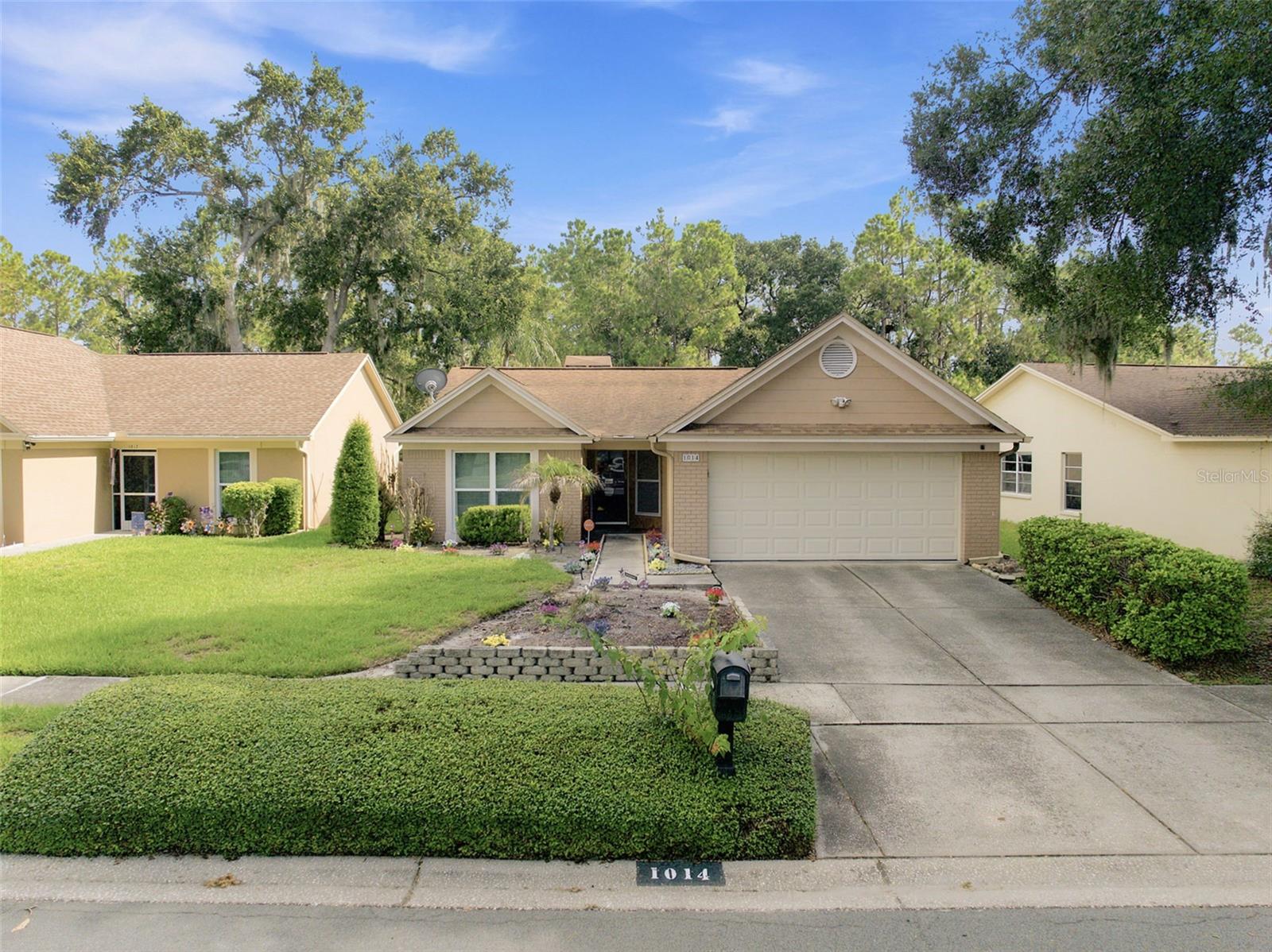 Just a short walk from the popular Three Bulls Tavern & Brewery, this beautifully updated 3-bedroom, 2-bath pool home offers the perfect blend of lifestyle, privacy, and convenience in the highly desirable Oakdale community of Valrico. Nestled on a premium homesite backing to a tranquil pond and conservation area, you'll enjoy exceptional privacy with no rear neighbors while being just minutes from shopping, restaurants, parks, top-rated schools, and major commuter routes. Inside, the thoughtfully designed split-bedroom floor plan provides both functionality and privacy. The inviting living room is anchored by a cozy fireplace, while the updated kitchen features quartz countertops and opens seamlessly to the main living areas. Luxury vinyl plank flooring, tastefully updated bathrooms, and energy-efficient windows add modern style, comfort, and efficiency throughout.  Step outside to your own private backyard retreat, where an expansive screened lanai and in-ground pool overlook peaceful pond and conservation views. Whether you're entertaining friends, enjoying a quiet morning coffee, or unwinding after a short stroll home from Three Bulls, this outdoor space offers the best of Florida living. Oakdale is one of Valrico's most established and sought-after communities, known for its mature oak trees, low HOA, no CDD fees, and unbeatable location just off Bell Shoals Road. Homes with private conservation views, updated finishes, and this level of walkability rarely become available.