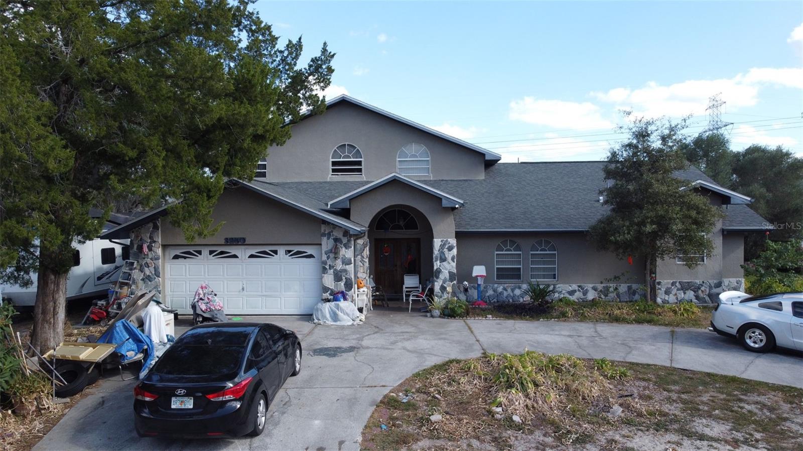 **MULTIPLE OFFERS - HIGHEST AND BEST BY SUNDAY 11/5 AT 9PM** OFFERS WILL BE REVIEWED MONDAY. This expansive 3,093 sqft home is a hidden gem just waiting to be polished. With four spacious bedrooms and three full bathrooms, this property offers the perfect canvas for an investor or ambitious homeowner to create their dream residence. Upon entry, you'll find tile flooring throughout the home, offering durability and easy maintenance. The floor plan is generous, allowing for numerous possibilities in terms of renovations and interior design. The house also boasts a cozy fireplace, adding a touch of rustic charm and warmth to the living space. One of the main highlights of this property is its large 0.30-acre lot. The sizable yard features a swimming pool, providing the perfect opportunity for outdoor entertainment or relaxation during warm summer days. This home is indeed a fixer-upper and requires significant renovation work. However, it presents a perfect opportunity for those who are not afraid of a project. With the right vision and some TLC, this house has the potential to be transformed into a stunning personal home or profitable rental property. Ideal for cash buyers or those utilizing FHA203K financing, this property is an excellent investment opportunity. Don't miss out on the chance to fully personalize this home and restore it back to its former glory!