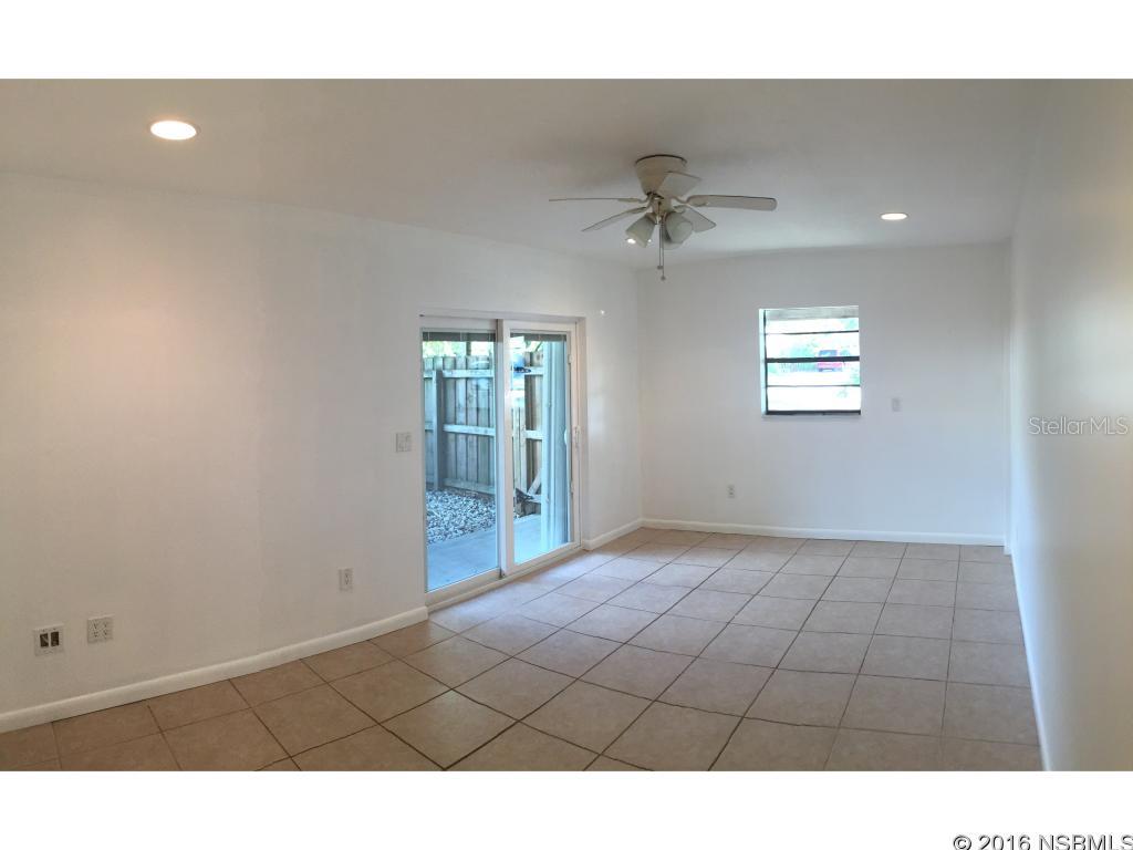 Welcome to paradise. This exclusive rental is just steps from the beach- with a public boardwalk at the end of the avenue. Features a circular driveway and large, completely fenced in back yard complete with pavers and an outdoor shower. Inside is freshly painted, newly renovated, and has a large washer and dryer. Brand new sliding glass doors bring in lots of natural light into the spacious living room and open onto the patio. The two bedrooms have large closets and multiple windows. Open the door in the kitchen for easy quick access to grilling or outdoor entertainment. This is for the DOWNSTAIRS unit, please note there are 2 tenants above. INCLUDED: ELECTRIC, WATER, & pest control (quarterly). Some pets allowed. Must have first & last months rent. $35 application fee per tenant, also must show proof of income & complete background check.