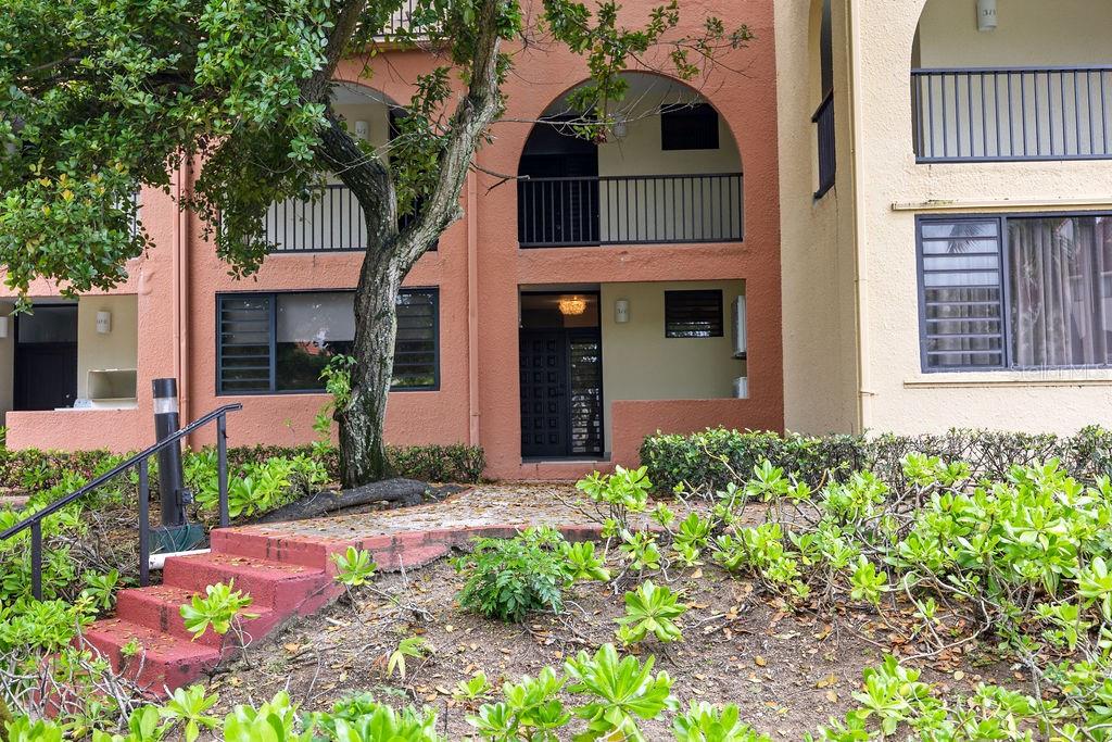 Welcome to your tropical retreat at Beach Village in the exclusive resort community of Palmas del Mar.
This beautifully remodeled, fully equipped ground-floor residence offers the perfect blend of elegance, comfort, and island living. Featuring 2 spacious bedrooms and 2 fully renovated bathrooms, every detail of this apartment has been thoughtfully updated with modern finishes and elegant design aesthetic. Enjoy seamless indoor-outdoor living with relaxing views of the lush golf course, creating a serene backdrop for your mornings and sunsets alike. The open-concept layout fills the residence with natural light, while the convenient ground-floor location provides effortless accessibility and a true resort-style feel. Located within one of Puerto Rico’s most sought-after gated communities, residents enjoy access to beaches, two championship golf courses, a marina, tennis and pickleball courts, equestrian facilities, dining venues, community services, and the unparalleled lifestyle that Palmas del Mar is known for. The community is also home to Palmas Academy, a private bilingual school, making it an exceptional place to live, invest, and enjoy. Therefore, great as a primary residence, second home or short term rental. Whether you are seeking a primary residence, a second home, or a short-term rental investment, this turnkey property presents a unique opportunity to own a refined piece of paradise.