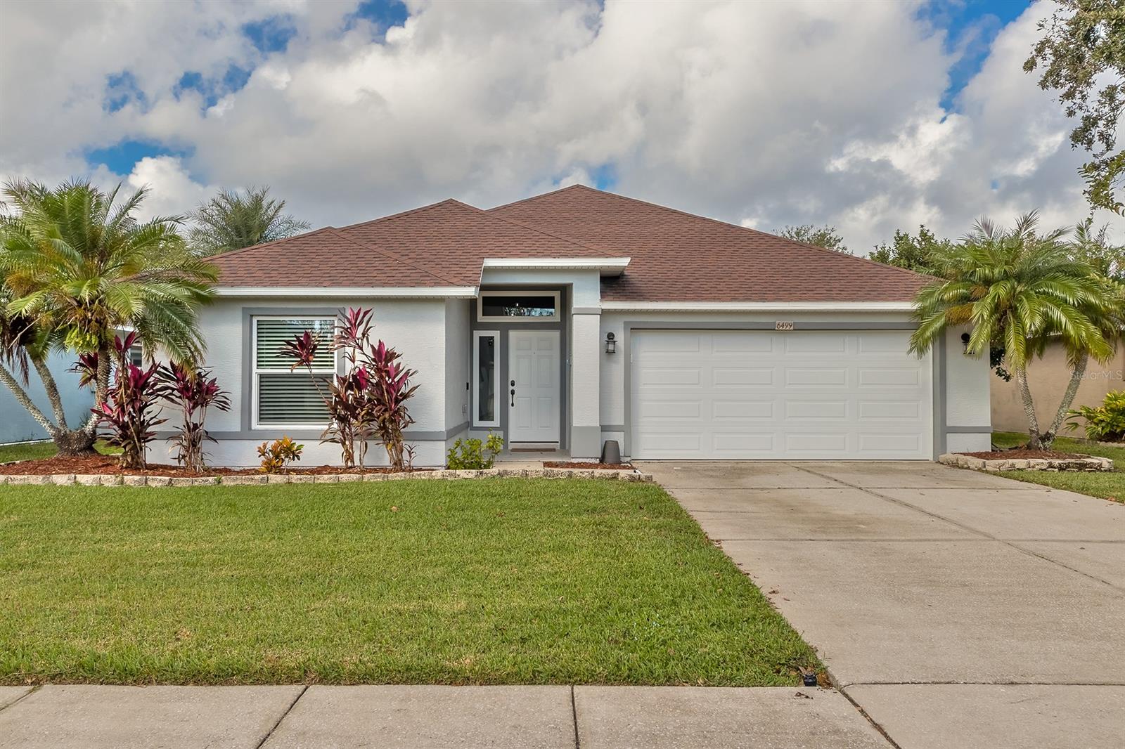 This beautiful three bedroom, two bathroom pool home is conveniently located in Water's Edge Community. Water's Edge is within walking distance to parks, elementary and middle schools. As you approach the home you immediately feel welcomed with beautiful landscaping and a spacious entry-way. The open floor plan and beautifully updated kitchen give this home a modern customized feel. The Owner's Suite has two large walk-in closets, a beautiful walk-in shower, double sink and private water closet. The roof, air conditioning, and windows are all 5 years old! This home is set up for entertaining, the temperature controlled bonus room has unlimited options! The Bonus room opens up to a beautiful pool area with a brand new screened in lanai as of June 2022. Come check out this great home, it won't last! ;Water: City