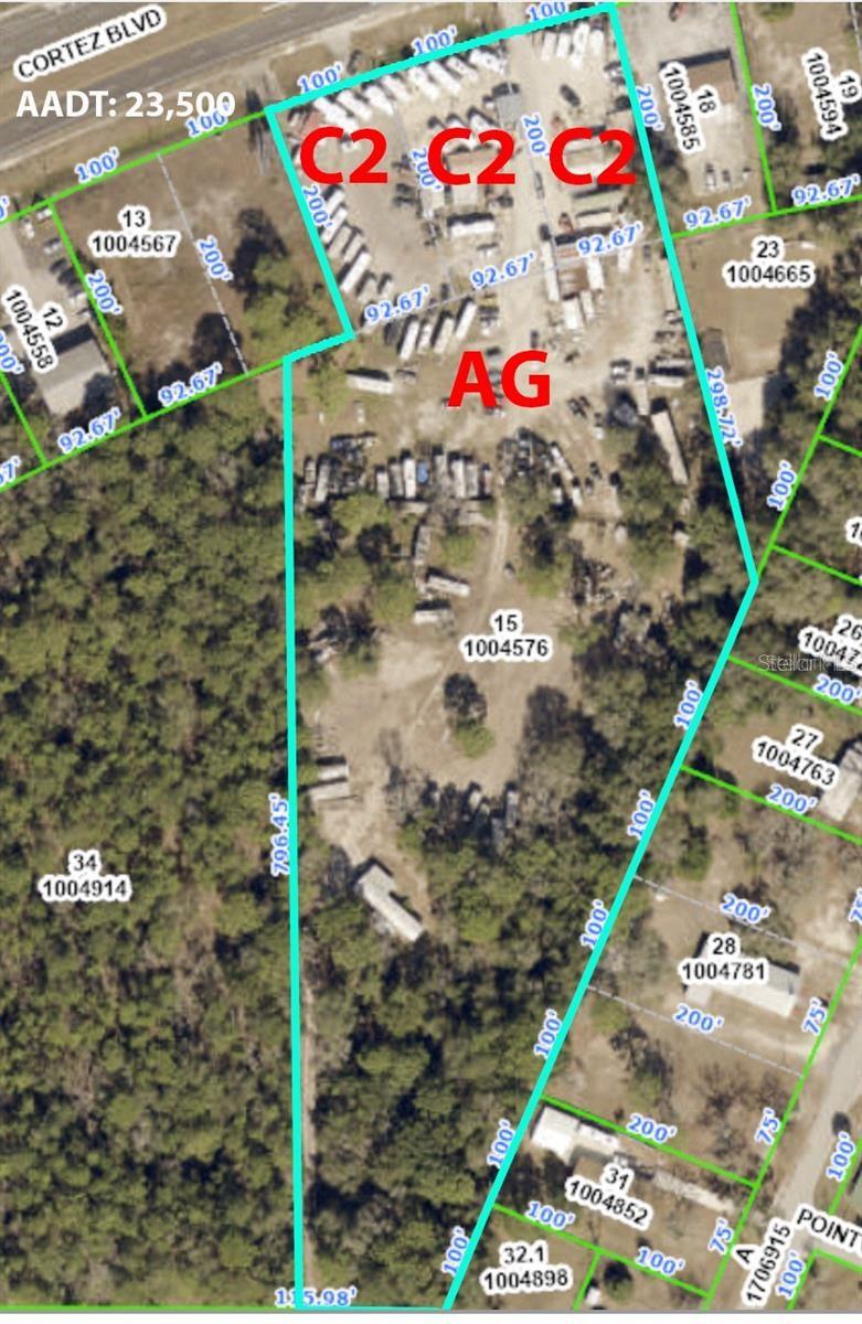 ALMOST 7 ACRES on right on CORTEZ BLVD (Hwy 50)...just east of the Suncoast Parkway (Toll Road 589). GREAT LOCATION!! Annual Average Daily Traffic Count: 23,500 AADT. PAUL CLARK SHEDS LOCATION. The property is made up of 4 parcels. There are 3 parcels on Cortez that are zoned C2 (each lot is 100x200...so 300 feet of frontage on Hwy 50) and a large parcel adjoining the back of it that is zoned AG is 5.6 acres. This makes up the almost 7 acres. EASY ACCESS in the eastbound lanes and a dedicated turning lane for the west bound traffic directly into the business!! Just west of Ft. Dade Rd, across from the big 7-11 gas station. Lots of room for your business. Only physically attached buildings convey.Everything on the property is available for sale separately. Growing area with great road frontage and visibility.