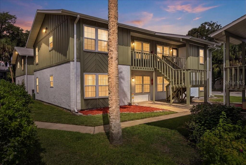 Affordable, updated, and easy to love! This first-floor corner condo offers comfort, convenience, and a carefree lifestyle in a central location between Daytona Beach and Ormond Beach. Beautiful luxury vinyl plank flooring flows throughout the condo, creating a clean and modern feel from the moment you enter. The updated kitchen features granite countertops, stylish cabinetry, an eat-in area, and a peaceful landscaped view from the kitchen window. All appliances convey, including the 2022 microwave. The great room offers comfortable living space for relaxing or entertaining. The bathroom has been beautifully renovated from floor to ceiling with a stylish granite countertop and updated shower. The spacious guest bedroom offers flexibility, while the primary bedroom features a large wall-to-wall closet. Extra locked storage is conveniently located just outside the front door.  Major updates include HVAC and water heater replaced in 2022, plus new windows in 2026. The seller will pay the full window assessment at closing. No other assessments scheduled or are due at this time.  Monthly maintenance is only $360 and includes water, sewer, trash, management, common area insurance, common area landscaping, large on-site laundry facility, sparkling community pool, tennis courts, and clubhouse plus convenient #73 parking spot. Minutes from major thoroughfares and less than five miles from the beach, this condo offers updated living, great amenities, and an affordable way to enjoy the Florida lifestyle. Must see -- take a look and see for yourself!