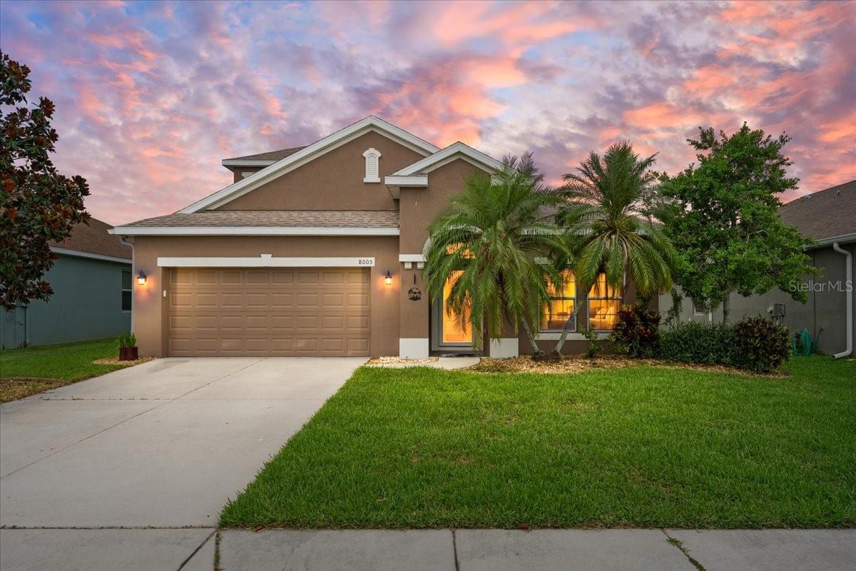 Beautifully maintained water-view home in the gated community of Copperstone! This spacious and entertainment-friendly home offers 3 bedrooms, 2.5 baths, a dedicated office/den, and an upstairs bonus room with a closet that can easily function as a 4th bedroom. The open floor plan features large tile flooring, granite countertops in the kitchen and bathrooms, a stylish kitchen backsplash, hardwood staircase, and a charming barn door leading to the upstairs bonus space.

The primary suite, two additional bedrooms, and office are conveniently located on the first floor. Enjoy peaceful pond views and stunning sunsets from the covered, tiled, screened lanai, complete with hurricane-impact sliding glass doors and a fully fenced backyard overlooking the water.

Additional features include two HVAC systems, washer and dryer conveyance, and extra garage storage. Copperstone offers resort-style amenities including two pools, splash pad, clubhouse, fitness center, tennis court, basketball court, and playground. Cable and internet are included in the fees.

Ideally located near Parrish-area schools, shopping, colleges, future hospital access, Ellenton Premium Outlets, and with an easy commute to Sarasota, Bradenton, St. Pete, and Tampa.