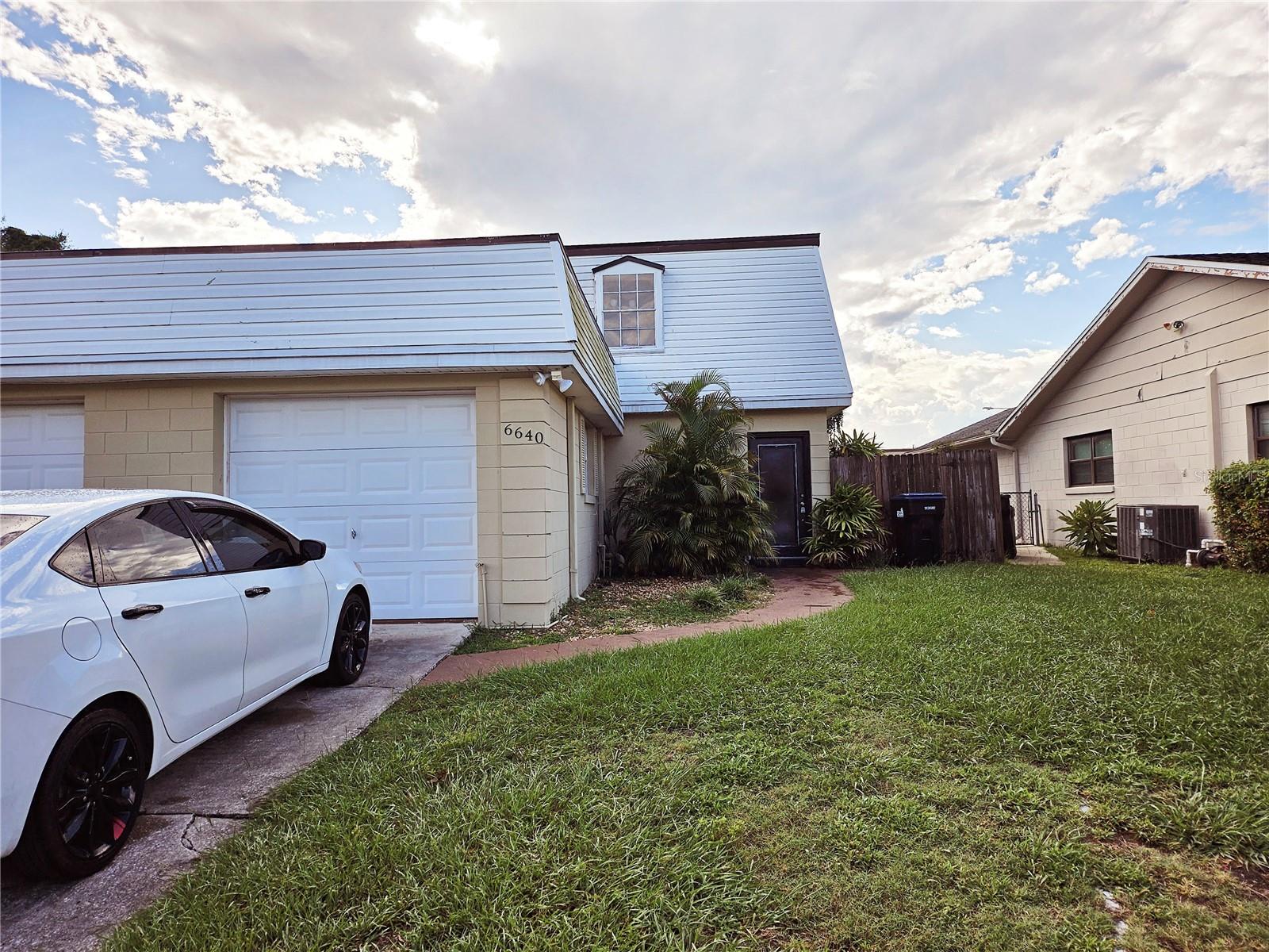 Very spacious half of a duplex with 2 bedrooms on the second floor and a full bathroom. Downstairs are the living room, dining room, and half bathroom, as well as 2 additional rooms with personal ACs. Attached garage in the front and good backyard in the back for all your BBQ and outdoor enjoyment.
Very nice and quiet neighborhood, close to shopping at Florida Mall and plenty of dining. Good public school near by.