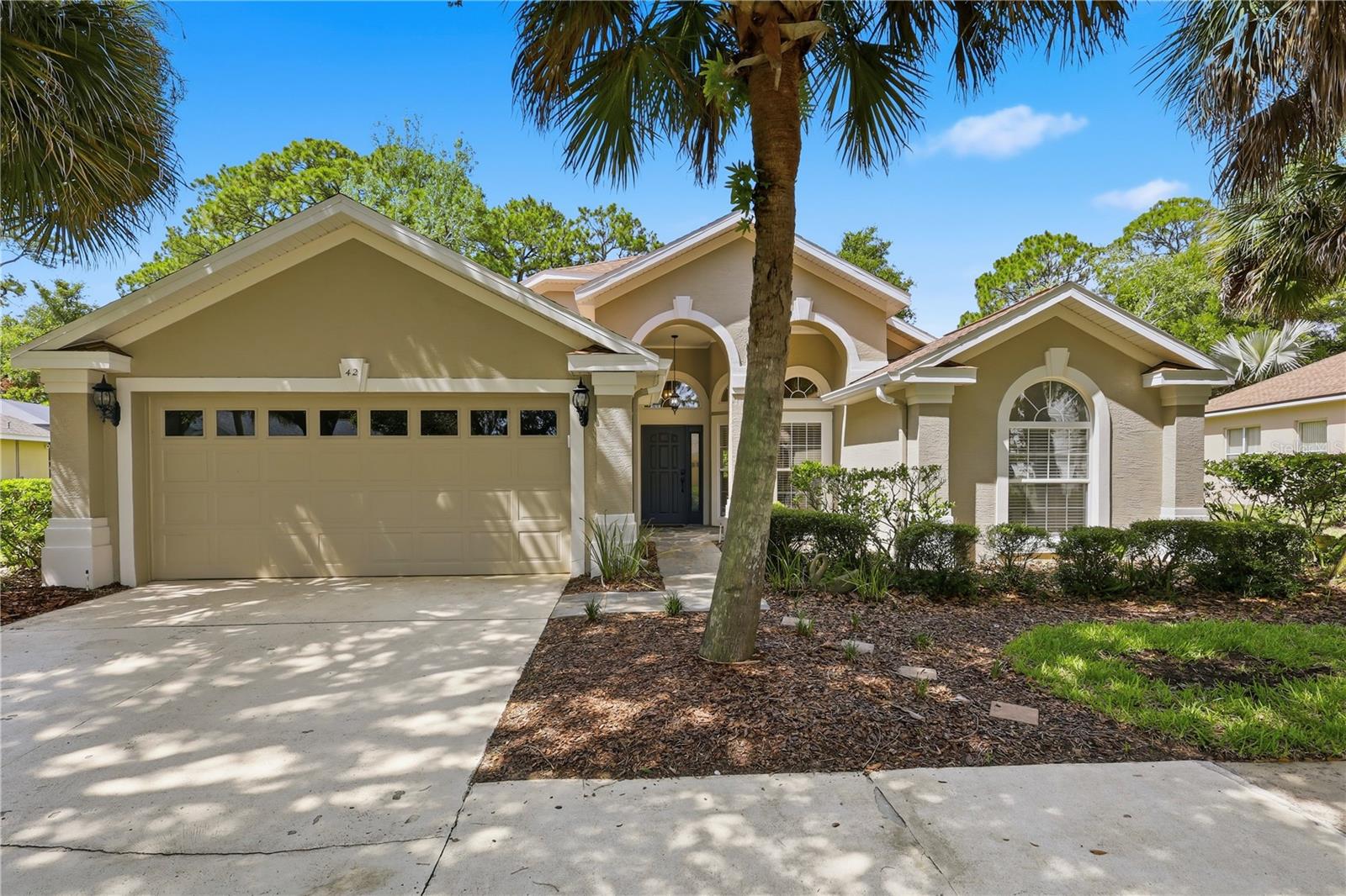 Don’t miss this incredible opportunity to own one of the best values in the highly sought-after, gated community of Grand Haven. This beautifully maintained 3-bedroom, 2-bath home with a 2-car garage offers the perfect combination of comfort, elegance, and resort-style living.

Step inside to soaring ceilings and a bright, open floor plan featuring beautiful hardwood floors throughout the living areas. The home offers a formal living room, formal dining room, and a spacious family room, providing plenty of space for both everyday living and entertaining. The kitchen is appointed with granite countertops, ample cabinetry, and overlooks the main living area.

Designed with privacy in mind, the desirable split-bedroom floor plan features a spacious primary suite tucked away from the guest bedrooms. The primary retreat offers a large walk-in closet and a private en-suite bathroom complete with dual vanities, a relaxing garden tub, and a separate walk-in shower. The two guest bedrooms are generously sized and share a full bathroom on the opposite side of the home.

Step outside to the covered lanai overlooking a peaceful nature preserve, creating the perfect setting to enjoy your morning coffee or unwind at the end of the day while enjoying the privacy and beauty of the natural surroundings.

Living in Grand Haven means enjoying an unmatched lifestyle with world-class amenities, including a Jack Nicklaus Signature Golf Course, two resort-style community pools, two fitness centers, tennis courts, pickleball courts, two on-site restaurants, and miles of scenic walking and biking trails along the Intracoastal Waterway.

Whether you’re looking for a primary residence, seasonal getaway, or investment opportunity, this home offers exceptional value in one of Palm Coast’s premier gated communities. Conveniently located close to shopping, dining, medical facilities, and just minutes from the beach, this home truly offers the best of Florida living. Easy to show and ready for its new owners! Seller offering 1 year Warranty to buyer at closing!
Roof 2018 AC 2017 Hot water heater 2020 Garbage Disp 2025, Irrigation pump 2024, Stove $ Dishwasher 2014 Quarterly pest control & Termite bon in place trough Massey