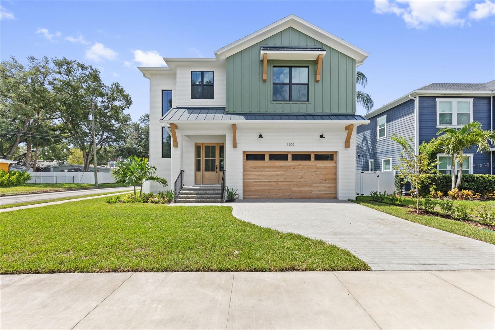 This ALL BLOCK NEW CONSTRUCTION HOME was just completed and is located in the heart of South Tampa in the highly desirable neighborhood of Maryland Manor / Virginia Park. The home features 5 bedrooms, 4.5 bathrooms, a bonus room, with one of the bedrooms and full bath on the first floor. Entering through the front door, a large foyer greets you, leading to the kitchen, great room and dining area. Enjoy cooking a favorite meal and spending time with family and friends in your new kitchen, which features Thermador appliances, double ovens, gas cooktop, and a large pantry. The great room has sliding doors that open onto your covered lanai, which includes an outdoor kitchen, ideal for entertaining or enjoying a quiet evening under the stars. Keep your home clean, organized and clutter free in your spacious mudroom with a bench, cubbies and hooks for coats, hats and backpacks. The second floor has a large bonus room, laundry room and 4 bedrooms. The primary suite offers a private retreat with walk-in closets, a large bathroom with walk-in shower, soaking tub and double vanities. Conveniently located to Tampa International Airport, Downtown Tampa, MacDill Air Force Base, International Plaza, top-rated schools, sporting events and some of the best restaurants in the Tampa Bay area.