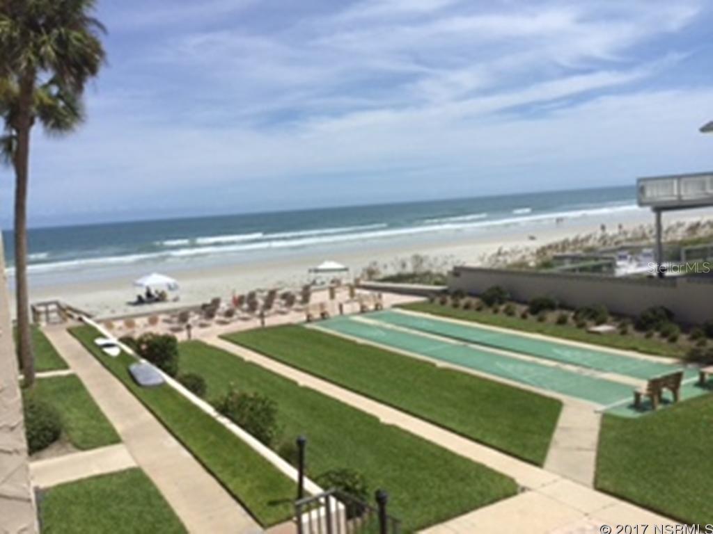 WOW!  This is an asked for condo in the rental pool. Everything in unit is included.  It has to be listed as a one bedroom but the owner had a contractor open the wall to make a second bedroom 10â9x7â9â.  The master has in the living room a sofa that is a queen pull out.  The master has a king and the other room has a queen size trundle bed.  Washer and dryer in the unit.  Beautifully decorated and extraordinarily clean.  Kitchen has been opened also and has an island kitchen.  Perfect location on the second floor.  Two units from oceanfront.  Awesome views of the ocean and the pool.  Complex is one of the closest complexes to the no-drive beach.  Chairs at the seawall (pavers) and pavers around the pool and kiddie pool.  New clubhouse.  Check this one out as it wonât last long!  Both A/C units inside and on the roof installed 4/2014. ;LocationDescription: Condo ;Water: City