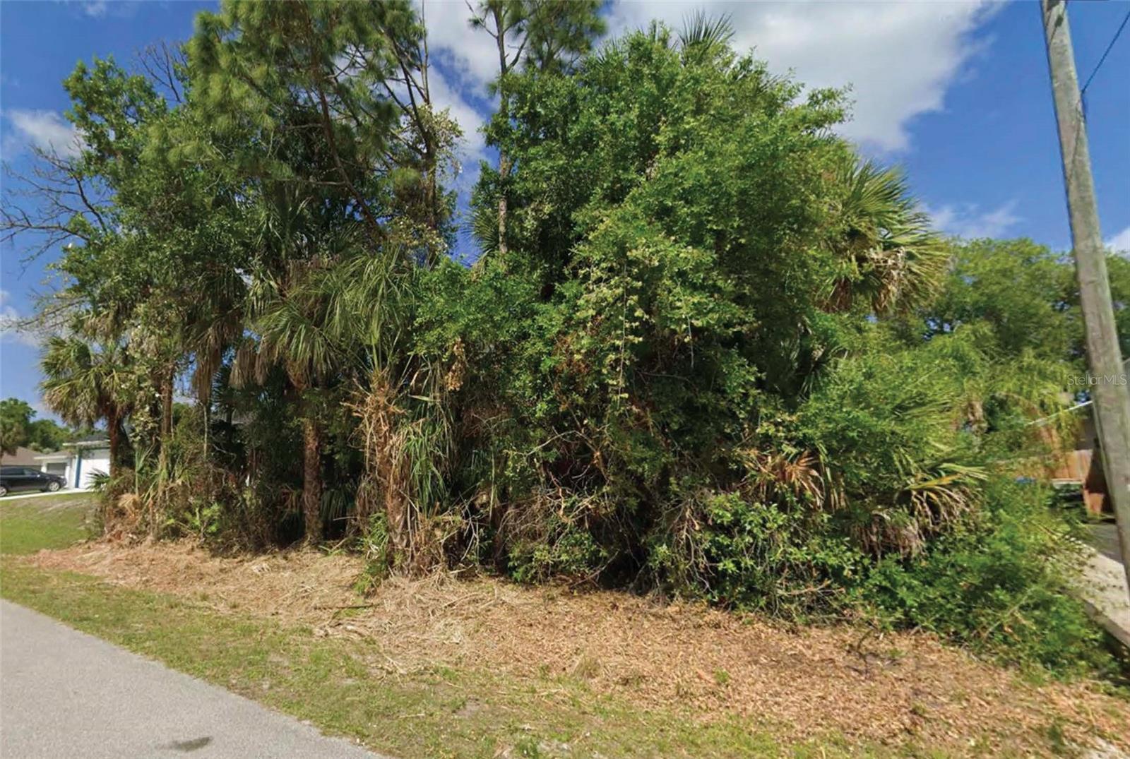 Residential vacant lot located in a desirable North Port neighborhood with paved road and surrounding residential development. This parcel offers an excellent opportunity to build a custom home in one of Southwest Florida's fastest-growing communities. Conveniently located near shopping, dining, schools, parks, golf courses, and major roadways while maintaining a quiet residential setting. No HOA. All information is deemed reliable but should be independently verified.