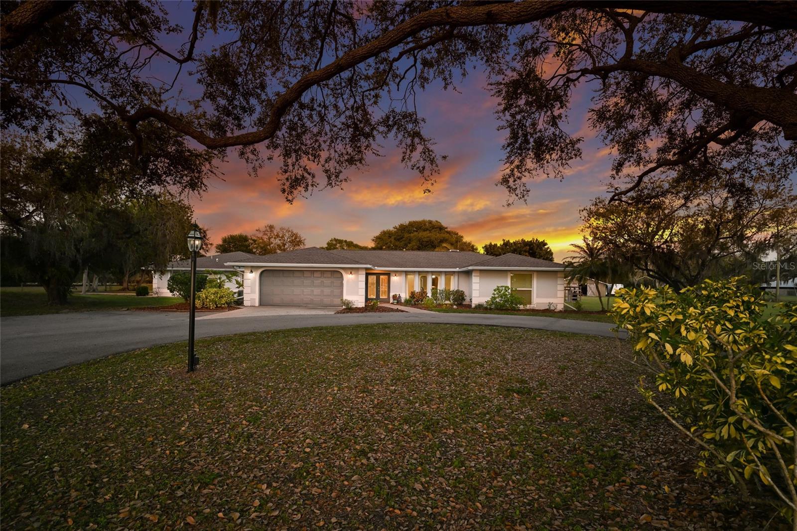 One or more photo(s) has been virtually staged. “NEW PRICE IMPROVEMENT! A Rare Opportunity with unmatched value to Own Three Distinct Residences in One Exceptional Property.” MULTI-GENERATIONAL HOUSING OR INCOME PRODUCING OPPORTUNITY!  Two separate 3BR/2BA Homes + an additional 2BR/2BA Apartment. Each of the homes enjoys its own private entrance, separate driveway and its own garage, allowing households zzzs to live side by side while maintaining independence.  And that's not all....the Workshop features a Full Bath and Laundry Room. In addition, there is another Barn which could accommodate 4+ Cars. This is truly a Quintessential Multi-Generational Compound on five-plus acres in Sarasota county, located adjacent to Waterside at Lakewood Ranch! Whether accommodating extended family, long-term guests or providing a private residence for caregivers, the thoughtful layout offers exceptional versatility. At the heart of the property, a beautiful pool and expansive screened lanai create an inviting backdrop for a Florida indoor/outdoor lifestyle. This outdoor retreat is positioned so both residences could enjoy easy access, making it a natural gathering place for family and guests alike. A dedicated pool bath adds convenience for swimmers and guests, keeping the indoor living areas pristine while enhancing seamless flow between indoor comfort and outdoor enjoyment. Expanding the living possibilities, perhaps you might want to consider using part or all of this property as Airbnb. The second-level apartment offers privacy with a light and airy vibe featuring an open plan and full kitchen. The unique adjoining sunroom spanning the length of the unit would be ideal for a yoga studio, game room or added entertainment space. Unlock the potential of this versatile apartment as a guest retreat, income-producing rental, inspiring studio or private office suite. This five-plus acre homesite with NO HOA, NO CDD's, and NO DEED RESTRICTIONS gives you the freedom to tailor the property to your personality. The large detached pole barn adds tremendous utility, providing ample space for farm animals, boats, RVs, equipment, hobbies or workshop use, ideal for those who need room to store, build or play. Buy with confidence knowing this home has a whole house generator, updated plumbing with no cast iron or copper piping. The cast iron sewer pipes have been replaced with PVC and the copper potable water pipes have been replaced with CPVC. The 4Point Inspection and Wind Mit has been completed.  Homeowner's Insurance only $6700 per year!   Experience the balance of peaceful country living with an unbeatable location. Within minutes of restaurants, boutiques, farmers markets, parks, and year-round events at the vibrant waterfront district at Waterside Place in Lakewood Ranch and only a short drive to the stunning beaches and renowned dining and cultural attractions of dynamic Sarasota. The home is positioned in one of the areas most dynamic growth corridors, just minutes to the newest Lakewood Ranch developments along Fruitville Rd corridor ~ where premier shopping, exceptional dining and modern conveniences continue to flourish! Whether you envision a private family compound, a multi-generational retreat, an income-producing opportunity or a flexible live-work estate, this remarkable property offers the rare combination of space, freedom and location. Schedule your private showing today and experience the endless possibilities for yourself. Welcome home to 1516 Fox Creek Dr!