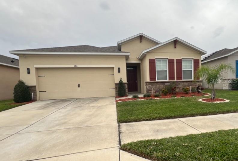Beautiful 3 bedroom/2 bath/2 car garage like new!!! community located in the heart of Winter Haven. Only 2 miles to Legoland, beautifully landscaped/fenced entry. It's between Lake Roy and Lake Lulu. City boat ramp is right around the corner on Lake Summitt. Close to all shopping, restaurants, medical. Home includes GRANITE in kitchen and both baths, tile floors everywhere except bedrooms and rounded corners. Many extras included as standard! Inside Laundry Room with washer and dryer included! Also lawn care is included!!! NO CARPETS! Make your tour today! This house is move in ready!