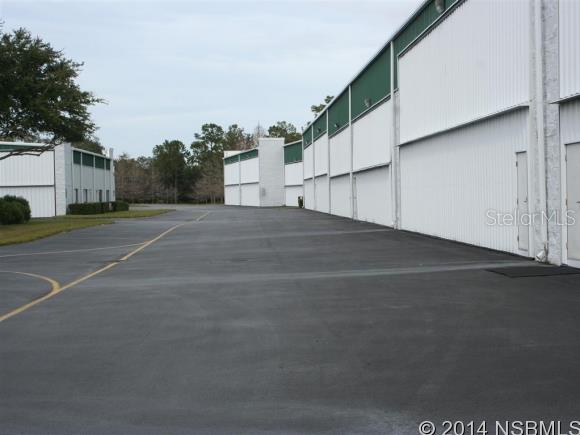 Crosswinds Hangar Condo Spruce Creek - Commercial Sale
