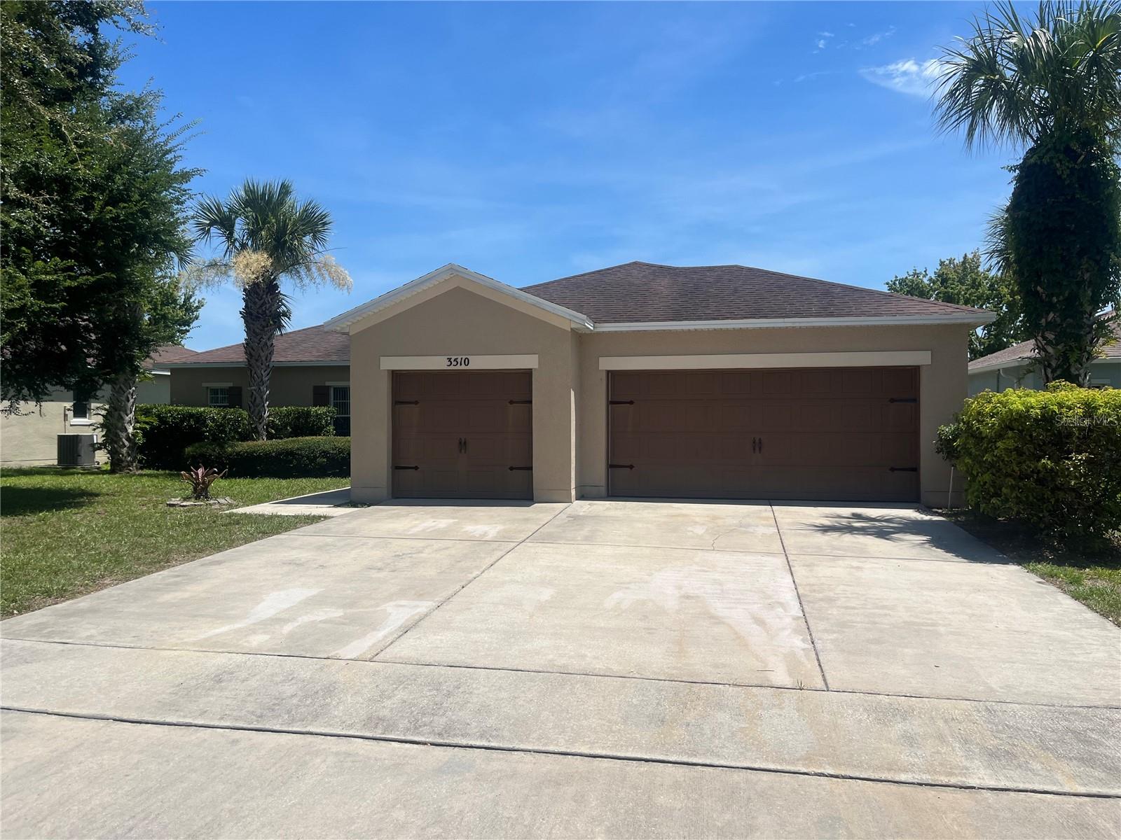 Beautiful single family home with three bedrooms and two full baths is located in the gated community of Bellapointe.  The open floor plan features tile flooring throughout the living area including the kitchen, dining room, great room and utility room. Kitchen has breakfast bar and large pantry.  Sliding doors open to patio and large backyard overlooking a tranquil pond. 
The split bedroom floor plan offers a private primary suite, which has a large walk in closet, built in closet and ensuite bath with dual sinks and walk in shower.  There are two additional bedrooms and a full bath.  Inside utility room conveniently located next to the kitchen and expansive three car garage.  
Bellapointe is conveniently located near Liberty High School and close to shopping, dining, Disney Springs and the Disney Parks.