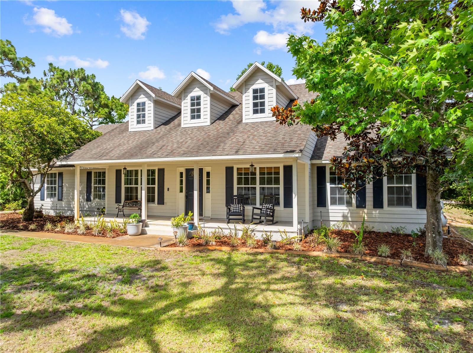 ** LITTLE RANCH ALERT**LISTED BELOW APPRAISED VALUE!!** Welcome to 2065 Mustang Ct. St. Cloud Fl. 34771!  This gorgeous 4 bedroom, 2 bathroom POOL home sits on 4.85 ACRES( about 2 acres high and dry) in Bay lake Ranch community where there is NO HOA! This little ranch features a well-maintained home with WOOD LIKE TILE throughout the whole living area, kitchen, laundry and Master bedroom. A recently updated kitchen and master bath with granite countertops. ** 2025 BRAND NEW KITCHEN APPLIANCES** Pool was resurfaced in 2020 along with the well pump. Roof & HVAC was replaced 2018. Plenty of backyard space and access to  a 32’x48’ POLE BARN on CONCRETE SLAB with 14-foot clearance and dedicated 100-amp service, perfect for storing RV’s, boats, or your favorite toys. Chicken coop, sheds are already in place so bring your favorite animals! Zoned for horses.   Centrally located near major highways, schools, shopping, dining, hospitals, and Central Florida’s top attractions, including the beaches.