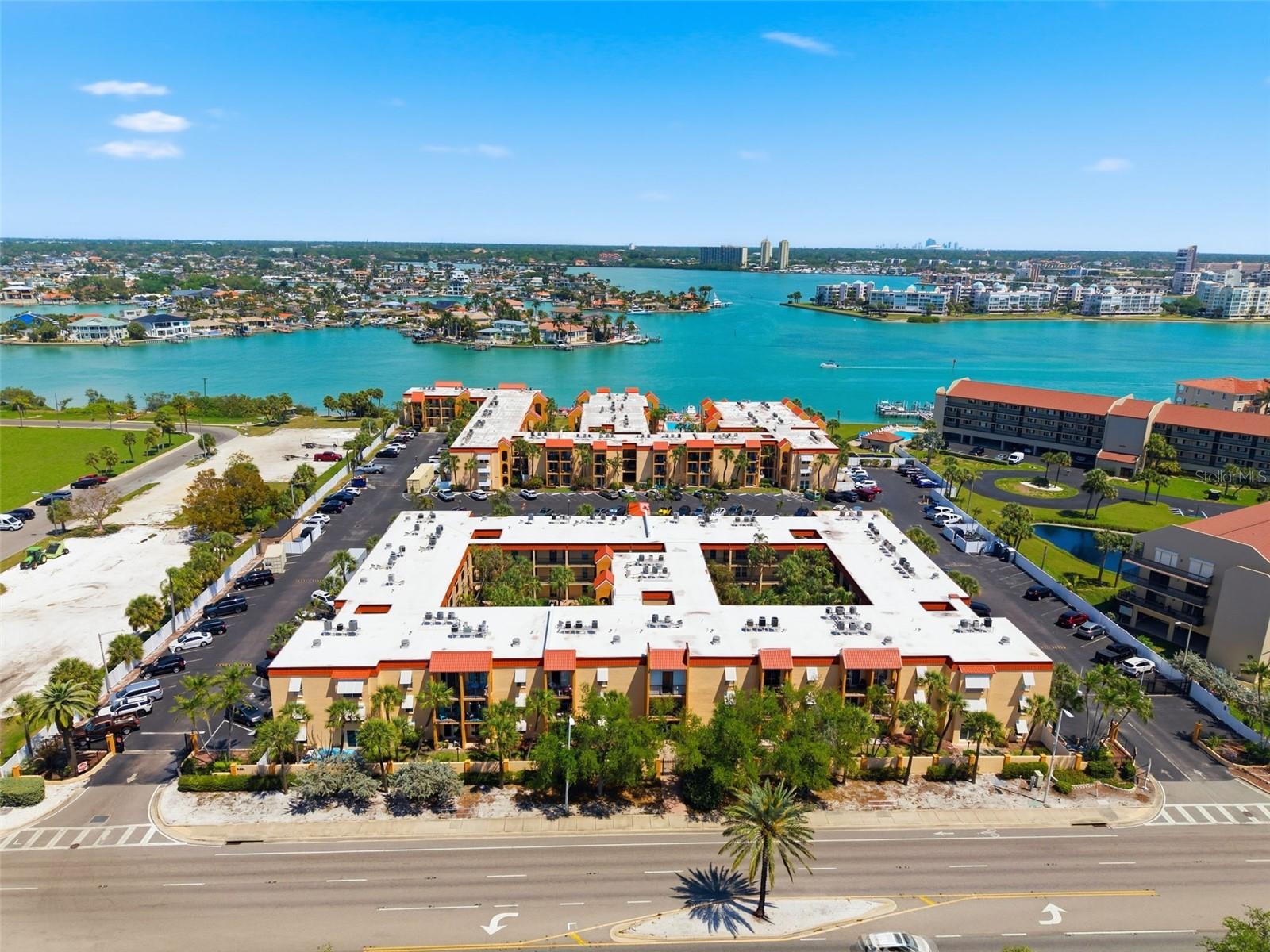 Boca Shores is calling you! if you are looking for a beautifully landscaped property with mature Florida vegetation with quick access to water with boat slips and easy access to the beach, and is affordable, then Boca Shores is here for you.  This unit has been beautifully renovated with all new appliances, updated kitchen and bathroom, new hot water heater, new windows, and fresh paint. There is still a little bit of work to be done. SELLER WILL LOOK AT ALL OFFERS! The lanai is steps from the water and the pool.  The laundry room is convenient down the hall. Several boat slips are available for rent at this time for $91 a month including electricity and water. A fishing dock awaits that has a cleaning table with water and lights and plenty of benches for friends and neighbors to watch the dolphins or the boats that pass. it is a great gaterhing space. The pool and sundeck are very friendly social places with happy hour get togethers and always welcoming newcomers while sitting by the Intracoastal Waterway. The pool is also a place of many conversations or just read a book and relax.A carwash on site spray cleans for $1.50 and 75 cents to vacuum - cant beat that! Storage is available for a nominal fee for bicycles and kayaks. A clubroom is home to card games and bingo in the season. Many celebrations also occur in the clubroom. A public boat ramp is in the park directly north of Boca Shores and includes boat parking. The park next door also has a tennis court, basketball goal, and a little league field. Corey Avenue in downtown St Pete Beach has fresh markets every Sunday and Treasure Island, just up the street has their fresh market on Friday mornings. There are great restaurants within close proximity. An official dog park is several blocks to the north in McKenney Park. Public transportation is so easy and inexpensive to use. The Trolley stops in front of Boca Shores and takes you all the way up to Clearwater. The FreeBee will take you anywhere in St Pete Beach for several dollars. Reident owners of St Pete Beach may park free in the Passagrille Beach and Upham Beach by getting your car registered with the city. A new theater opened on Corey Avenue and shows movies and other fun entertainment. A 20 minute drive to St Petersburg will allow you to explore the many art museums, festivals and wonderful restaurants. Disney World is a 90+ minute drive depending on the traffic. There is no better place to be! Come explore Boca Shores and enjoy the ambiance of a laid back environment or the opportunity to enjoy the many options for entertainment. You can have it all!