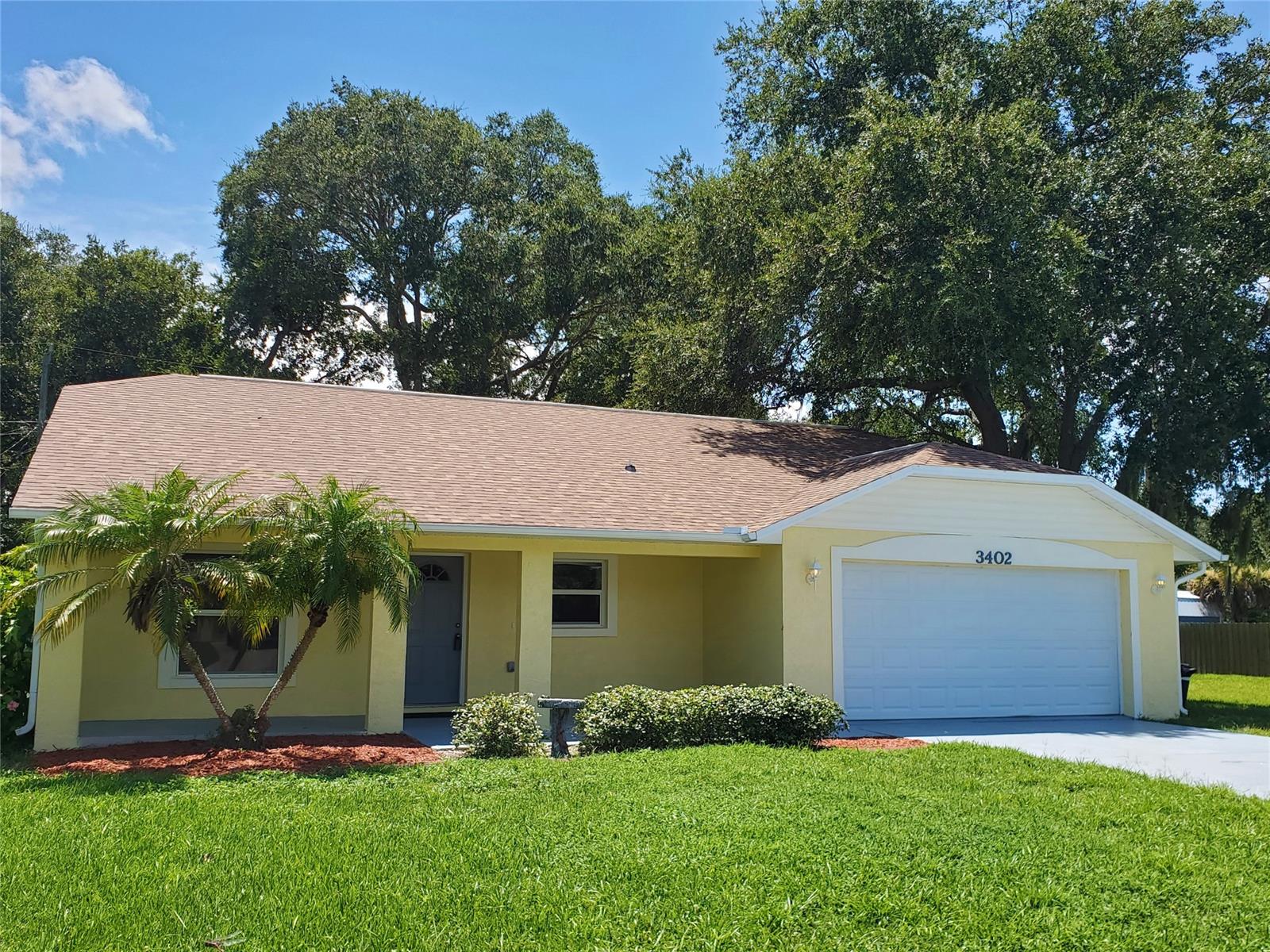 This just feels like home! The fresh sunny paint will catch your eye and you can't help but notice the brand NEW ROOF. Sit a while with a tall iced tea on your shady front porch or step through the door to settle in. The home has been freshly painted top to bottom and has new carpet in each of the three (split plan) bedrooms. The generous galley kitchen is open to the dining room & living room and overlooks the front yard. It also has a new dishwasher, disposal and vent hood The living area has wood laminate flooring throughout in a light tone, as well as neutral paint and high vaulted ceilings. There is an over-sized two car garage with new epoxy finish and door opener also houses a brand new water heater. A fenced yard as well as ample space to park your boat or RV complete the picture. Come see for yourself! ;Water: City