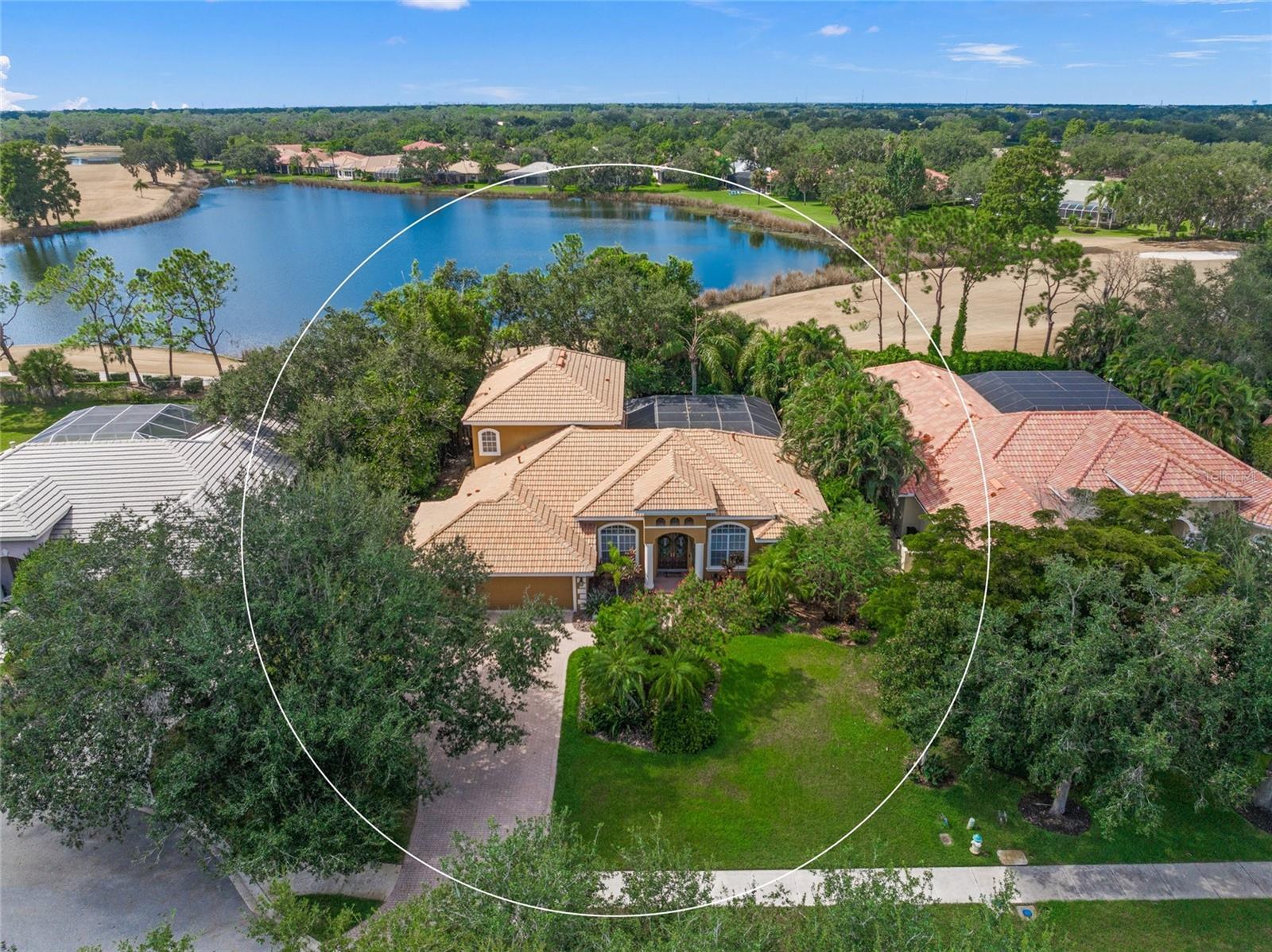This is the one * QUALITY BUILT BY PRUETT HOMES AND LOCATED BEHIND THE GATES OF THE RARELY AVAILABLE HAMMOCKS NEIGHBORHOOD, WHERE YOUR DREAM HOME AWAITS * 'A' RATED SCHOOL DISTRICT * Lovingly cared for, and the PRIDE OF OWNERSHIP SHOWS * This FAMILY ESTATE HOME is LOCATED ON A PREMIUM CUL DE SAC * 1/3 ACRE LOT IS A MUST-SEE PRIVATE SETTING * NO THROUGH TRAFFIC * This BEAUTIFUL home backs to VIEWS of Laurel Oak Golf Course and a lovely Lake * NO NEIGHBORS BEHIND YOU * This IMMACULATE 2 Story Home is a MUST-SEE * This Split Plan Design boasts a total of 5 Bedrooms PLUS Office/Den & 3 Baths * 2nd Floor features 2 Guest Bedrooms, 1 Bath & a 27x19 Bonus Room for entertaining and is perfect for kids or guests. DOWNSTAIRS: Primary Suite, 2 Guest Bedrooms, Den, Formal Living Room & Formal Dining Room with Gas Fireplace * Private Master Suite is LARGE with a HUGE Oasis Bath, Dual Sinks, Soaking Tub & a Separate Walk-in Shower * Gorgeous Chef's Kitchen opens to the Family Room with VIEWS to the Private, Heated Pool & Spa * This DREAM KITCHEN showcases a Pantry, Breakfast Bar, Nook/Dinette with Aquarium Glass, Wood Cabinets, Granite Counters, Gas Cook-top & Double Oven * Excellent home to entertain in or just relax in your slice of paradise * 3 car Garage allows for plenty of room for all the toys * Paver Brick Driveway * The Hammocks is a 24 hour gated community with low annual HOA fees * It has that country feel yet you are minutes to Siesta Key Beach, excellent schools, shopping & dining * Rothenbach Park & Publix Plaza are nearby * All the luxury features you desire are here! * One look & you'll fall in Love *