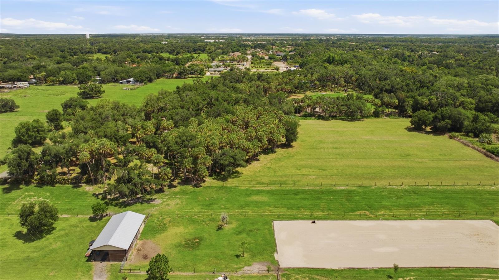 TAMIAMI FARMS - Land