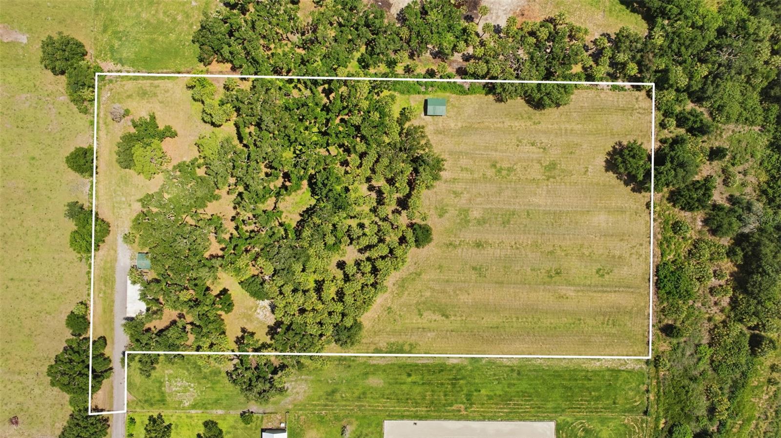 TAMIAMI FARMS - Land