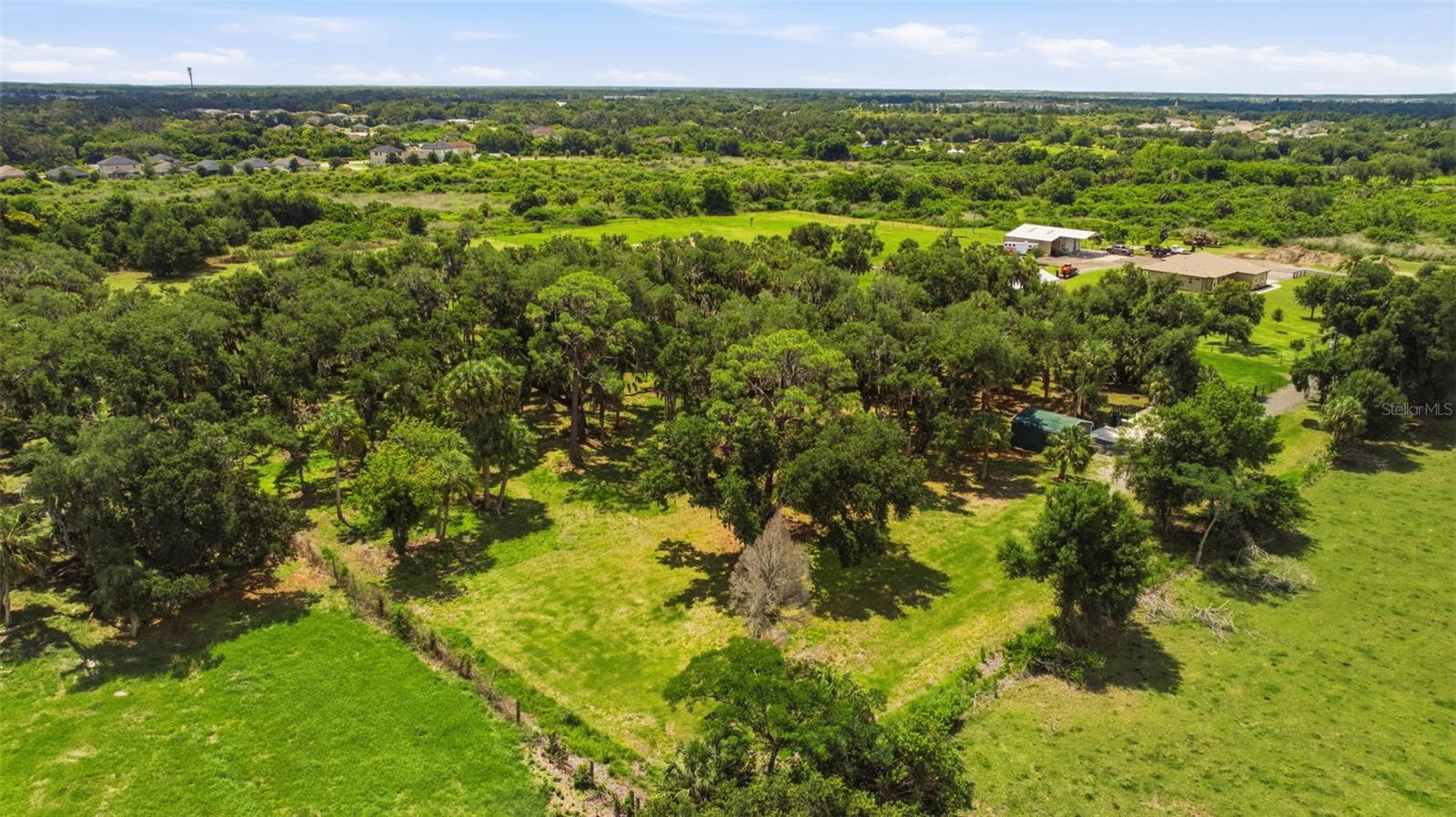 TAMIAMI FARMS - Land