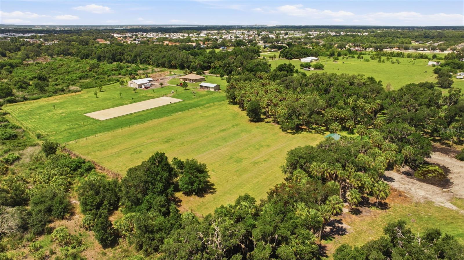 TAMIAMI FARMS - Land