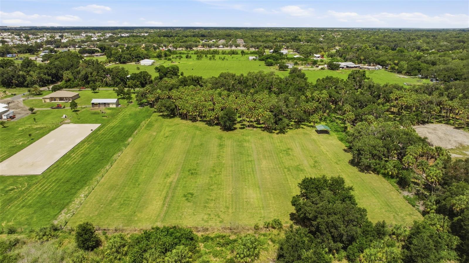 TAMIAMI FARMS - Land