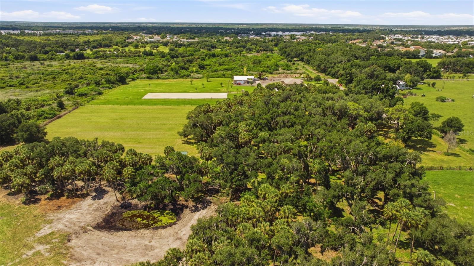 TAMIAMI FARMS - Land