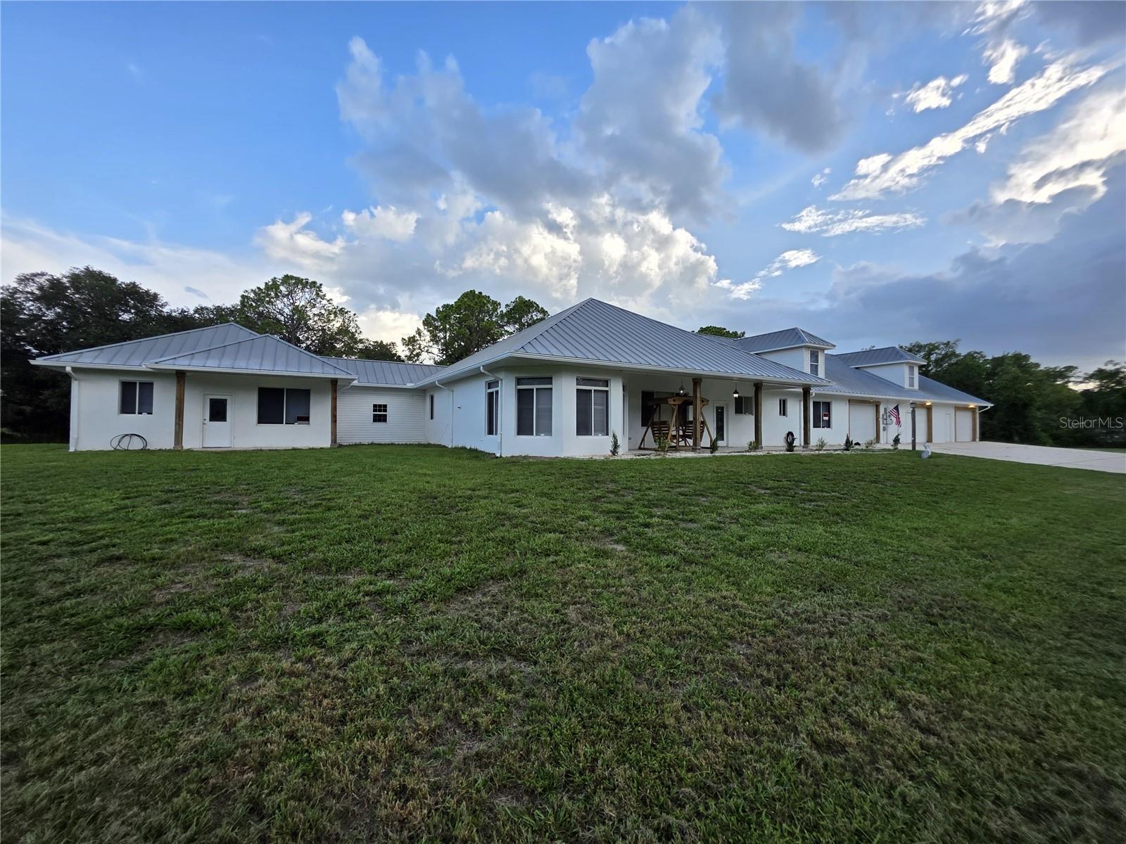WOW!!  Very rare opportunity to own this expansive concrete block estate offering 6 bedrooms, 6 bathrooms, a TEN car garage and an impressive 8,232 total square feet, with approximately 6,758 square feet under air, situated on a sprawling 1-acre corner lot with No HOA. Ideally located just minutes from Sebring International Raceway, shopping, dining, US-27, Highlands Hammock State Park, area lakes, and golf courses, this exceptional property offers space, versatility, and endless possibilities. Recent improvements include new wide-plank luxury vinyl plank flooring throughout, fresh interior paint, new toilets and light fixtures, pressure-washed exterior, three brand-new HVAC systems (four total A/C units), a brand-new automatic self-cleaning water filtration system with water softener, and a durable metal roof. Car enthusiasts, and RV owners will appreciate the abundant garage space, additional storage, air-conditioned garage, heavy equipment outlets, covered 100-foot RV carport, and 400-amp electrical service. The property also features two septic systems, a basketball court, plantation shutters, and a private attached mother-in-law suite or guest house complete with its own entrance and separate mailbox—ideal for multigenerational living, guests, or rental potential. With its incredible size, extensive amenities, and prime location, this one-of-a-kind property is truly a must-see.