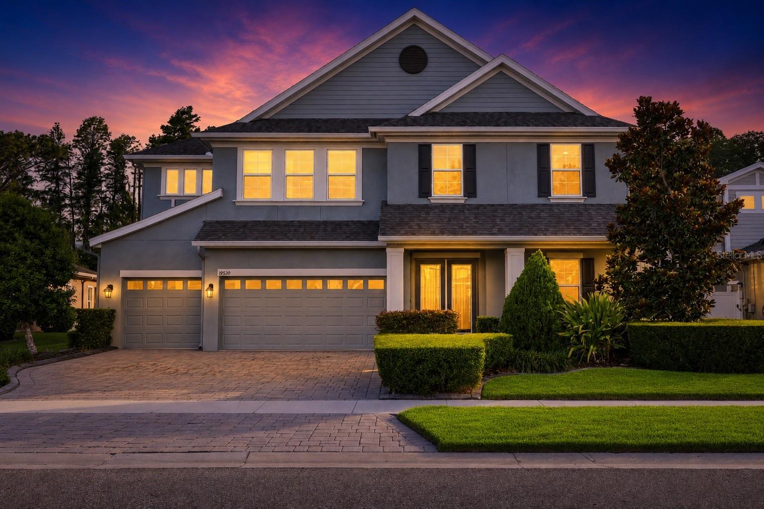Spacious 2018 Granada I home offering 4,846 square feet with 7 bedrooms, 5 full bathrooms, a dedicated home office, and an upstairs loft in the guard-gated Lakeshore Ranch community in Land O' Lakes, FL. This two-story home features a convenient main-level primary suite with oversized walk-in closets, full-home solar, and a 3-car attached garage, set on a fenced 0.29-acre cul-de-sac lot backing to conservation with wooded rear views. Located outside a flood zone.
The island kitchen features level 5 granite countertops, tile backsplash, built-in oven, cooktop, microwave, dishwasher, refrigerator, wine refrigerator, and casual dining space with open sightlines to the grand room. Upstairs, large secondary bedrooms include Jack-and-Jill baths, an oversized laundry room, and flexible bonus space well suited to work-from-home, guest, or multigenerational living. Interior upgrades include accent walls, upgraded lighting, sliding glass doors, and a mix of tile, luxury vinyl plank, and carpet flooring, plus a private balcony. Outdoor living includes a covered lanai, irrigation system, and fenced backyard backing to conservation.
Full-home solar helps support reduced electricity usage; the seller reports the current electric bill reflects the utility connection charge only, subject to buyer verification of solar ownership, transferability, utility billing, and actual savings.
Lakeshore Ranch amenities include a resort-style pool, lap pool, kiddie pool, 24/7 fitness center, tennis courts, basketball courts, playground, clubhouse, and neighborhood green space. The community sits minutes from the Suncoast Parkway for a direct route to Tampa International Airport, with shopping and dining along the SR-54 corridor, Tampa Premium Outlets, and The Shops at Wiregrass.
View the 3D tour, floor plan, and virtually staged media for additional layout context, and schedule your private showing of this Lakeshore Ranch home in Land O' Lakes, FL today.