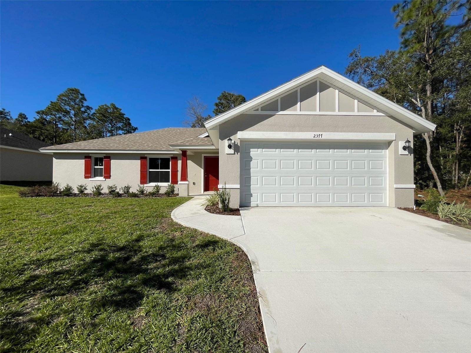 Discover the perfect blend of modern style and everyday comfort in this brand new 3-Bedroom 2-bath
home located in the desirable Citrus Springs community. Designed with an open floor plan, this home
offers a bright and spacious living area that flows effortlessly into the kitchen and dining spaces,
creating an ideal setting for gatherings.
The kitchen showcase upgraded cabinetry, attractive countertops, and plenty of storage, while durable
vinyl plank flooring adds both style and practicality throughout the main living areas. The
thoughtfully designed split bedroom layout provides privacy for the owner's suite which has a walk-in
closet, while maintaining a functional flow throughout the home.
Outside, the irrigation system helps keep your lawn looking its best with minimal effort, conveniently
located near shopping, dining, Schools and outdoor recreation, this newly constructed home offers the
opportunity to enjoy modern living in one of Citrus County's most popular growing communities.
Schedule your private tour today!