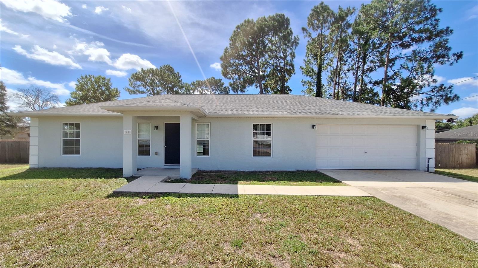 Conveniently located just off SE 64th Ave Rd. New roof in 2025. 3 bedroom 2 bath split plan with 2 car garage. New LVP flooring throughout. Kitchen includes all appliances. Refrigerator, dishwasher, range and built in microwave. Large built in pantry closet. Laundry room is oversized for additional storage and includes washer, dryer and water softener.  Master bed and bath includes custom ceramic tile shower and walk in closet. Back yard is enclosed with 6 ft privacy fence to enjoy a bit of seclusion.