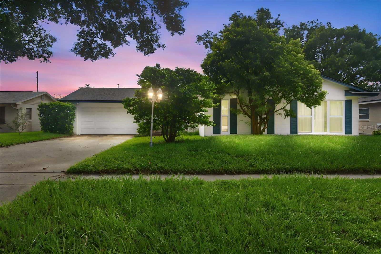 Welcome home to this beautifully updated three bedroom, two bathroom pool home in the heart of Conway, just a four-minute walk down the quiet street to A-rated Pershing K-8 School and only four minutes from the Fern Creek boat ramp on the Conway Chain of Lakes. Thoughtfully renovated with the major updates already complete, including a new roof (2025), windows (2022), water heater (2025), A/C (2018), luxury vinyl plank flooring (2020), and a show-stopping open concept kitchen (2020) featuring quartz countertops, a waterfall island, subway tile backsplash, updated cabinetry, and appliances. Both bathrooms have been beautifully remodeled, and additional improvements include solid-core interior doors, closet organizers, and a variable-speed pool pump (2021). Step inside to an open living and dining space designed for everyday living and entertaining, with easy access to the screened pool and covered lanai. The split bedroom floor plan offers added privacy, while the spacious primary suite features an oversized 11x9 walk-in closet with natural light and an elegant resort-style bathroom finished with marble tile, dual sinks, and a large walk-in shower. The secondary bedrooms share an updated guest bath. Outside, enjoy your private backyard with room to play or garden, complete with fruit trees, raised garden beds, and a storage shed. Ideally located just minutes from the SoDo District, downtown Orlando, major medical centers, shopping, dining, and convenient highway access.