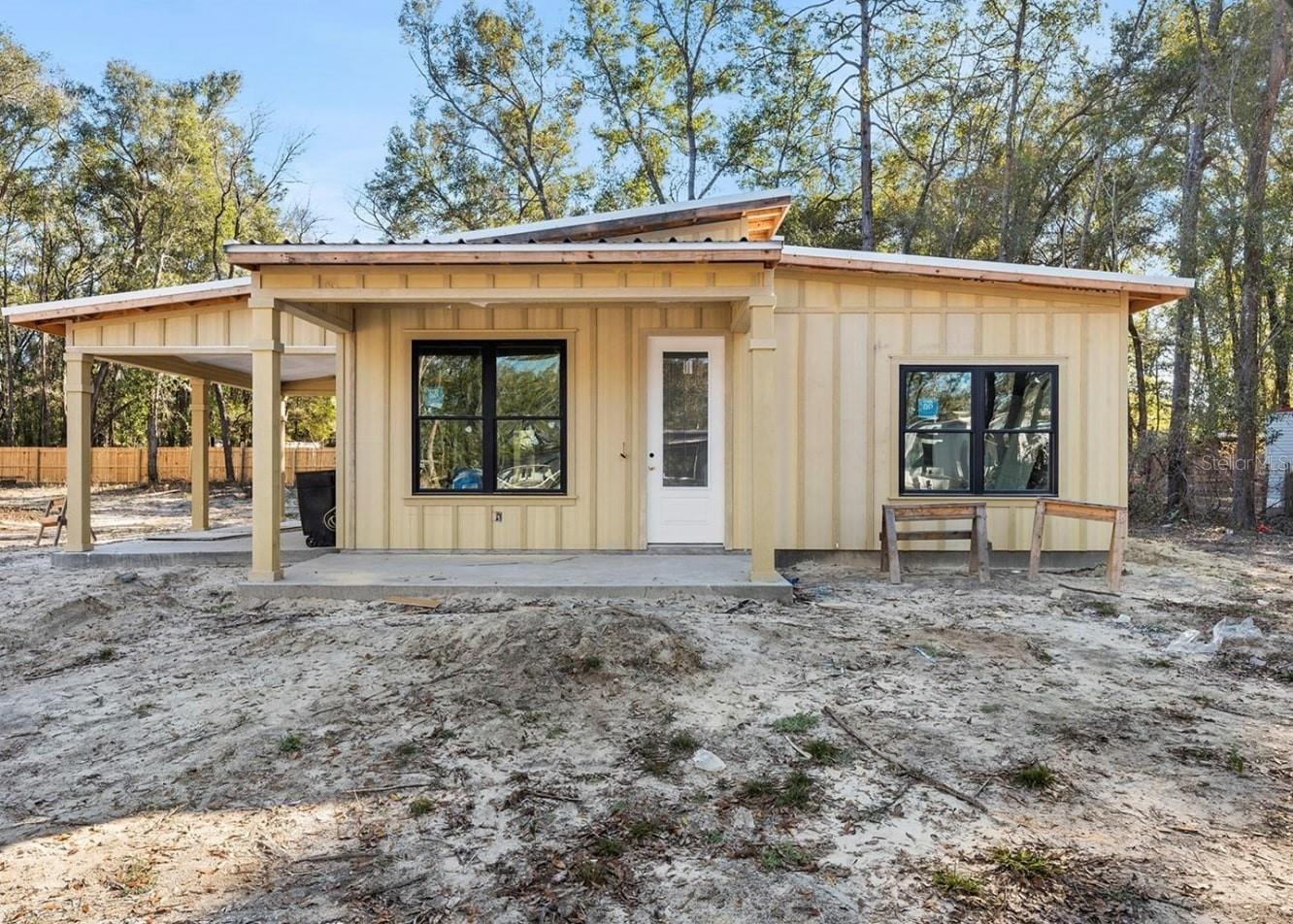 Under Construction. New Construction! Welcome to one of Vision Construction's newest models - The Laredo! This appealing new style features a bright & open floor plan and sits on a generous 1/4 acre lot located 5 minutes from downtown Newberry w/low Gilchrist County taxes. The home features vaulted ceilings in the living room & master suite, a spacious island kitchen, energy efficient appliances & raised panel custom wood cabinets. Enjoy indoor/outdoor living in the gorgeous Florida weather on your oversized covered lanai perfect for entertaining and right off of the kitchen for the ultimate convenience. The luxury master suite boasts an inviting bathroom w/double vanities, European style shower & roomy closet. There is no shortage of storage in this home including a sizable laundry area for all of your organizational needs! Home features a 1-car carport!