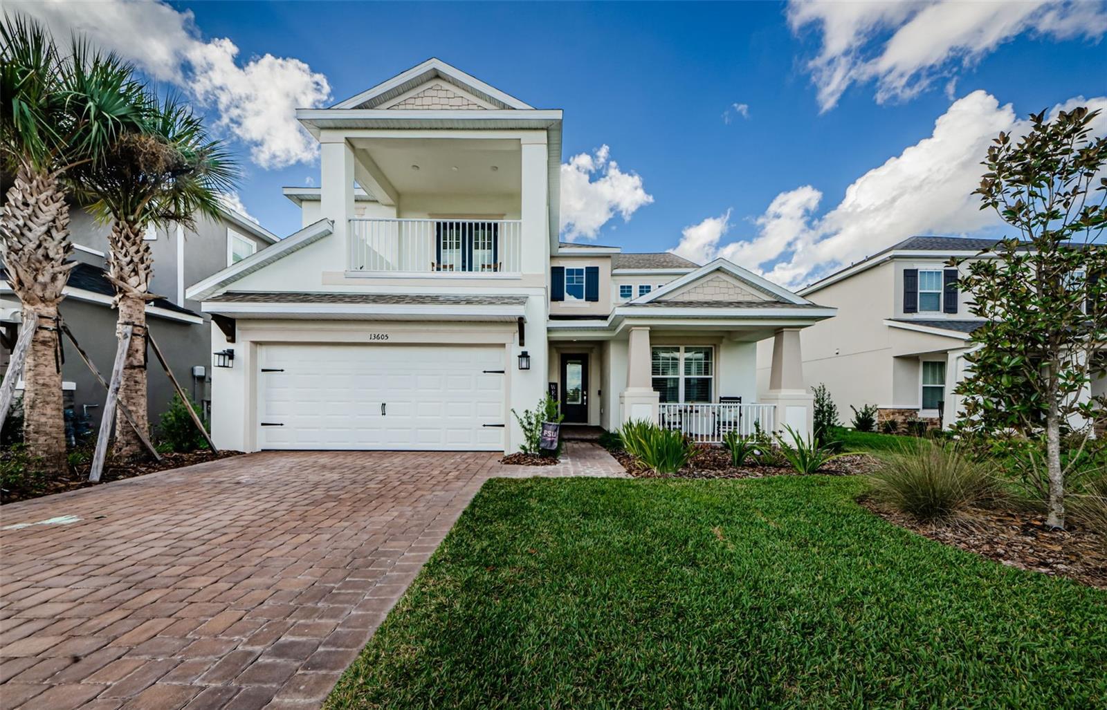 Welcome to your dream home in the heart of Starkey Ranch, the #1 master planned community in the Tampa Bay Area. This stunning 4-bedroom, 3.5-bathroom residence with a 2-car garage boasts nearly 3500 square feet of luxurious living space. As you approach, the home's curb appeal is immediately apparent, with a charming front porch and a balcony that overlooks the meticulously landscaped front yard. The pavered driveway and porch add a touch of elegance to the exterior. Step inside and be greeted by an open and inviting floor plan, featuring a formal dining room and a formal living room. The open-spindled staircase adds a touch of sophistication, leading you to the upper level. The kitchen is a chef's delight, equipped with stainless appliances, a large center island, double oven, cooktop, stainless range hood, and quartz countertops. The eat-in space provides a cozy spot for casual dining. The adjacent family room, with sliding doors to the outside, creates a seamless indoor-outdoor living experience. The spacious owner's suite on the upper level is a retreat in itself, featuring a tray ceiling, French doors leading to the balcony, and a spa-like ensuite bath with a double vanity, soaking tub, and a glass shower with a rain shower head. The loft/bonus room provides additional flexible living space. The guest rooms are generously sized, with two of the three rooms connected by a Jack & Jill bathroom with dual sinks, granite countertops, and generous storage. Outside, the covered patio overlooks a conservation area, ensuring privacy with no rear neighbors. There's plenty of room to add a pool and create your own outdoor oasis. Living in Starkey Ranch means enjoying a host of amenities, including multiple community pools, a K-8 magnet school, splash pad, dog park, miles of walking trails, a baseball field, parks, soccer field, playgrounds, tennis courts, theater, library & cultural center, amphitheater, and community gardens. Beyond the community, you'll find convenience with nearby shopping, restaurants, medical facilities, golf courses, beaches, and easy access to the Suncoast Parkway. Experience the perfect blend of luxury, comfort, and community living in this Starkey Ranch masterpiece. Schedule your showing today.