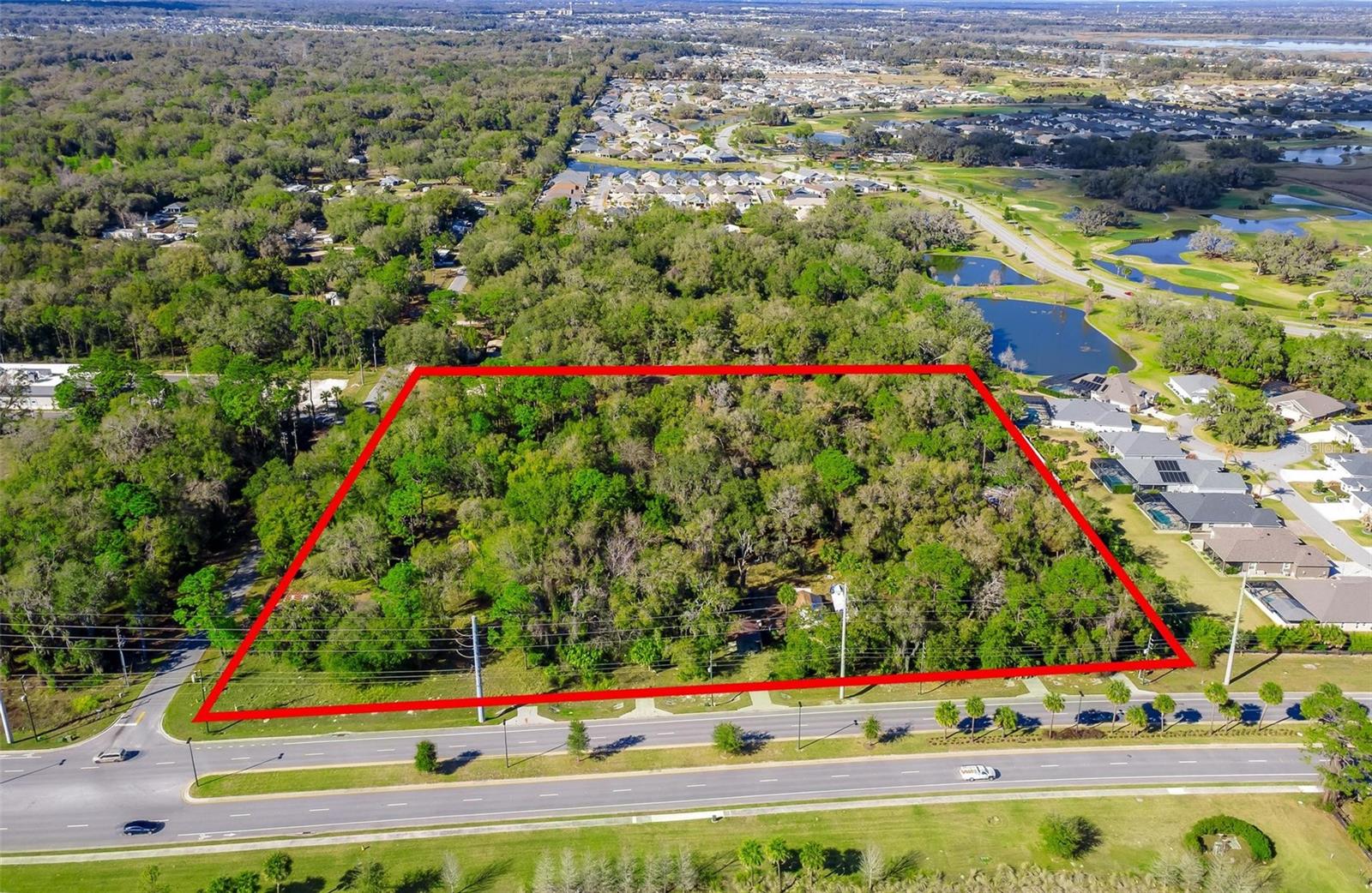 RECENTLY ANNEXED INTO WILDWOOD!  Exceptional opportunity to acquire a 9-acre parcel recently annexed into the City of Wildwood. The property was approved as Commercial Mixed Use, making it well suited for a variety of commercial development opportunities.  Strategically located on Warm Springs Avenue, the site offers excellent visibility and exposure with almost 19,000 trips per day. The property sits just west of the Magnolia Shopping Plaza / Everglades Recreation Center, and just east of the intersection with US301, placing it in the path of continued commercial growth.  The location also provides convenient access for residents of The Villages. This is a 7 parcel assemblage, the existing structures have no value.  Buyer to verify all information.