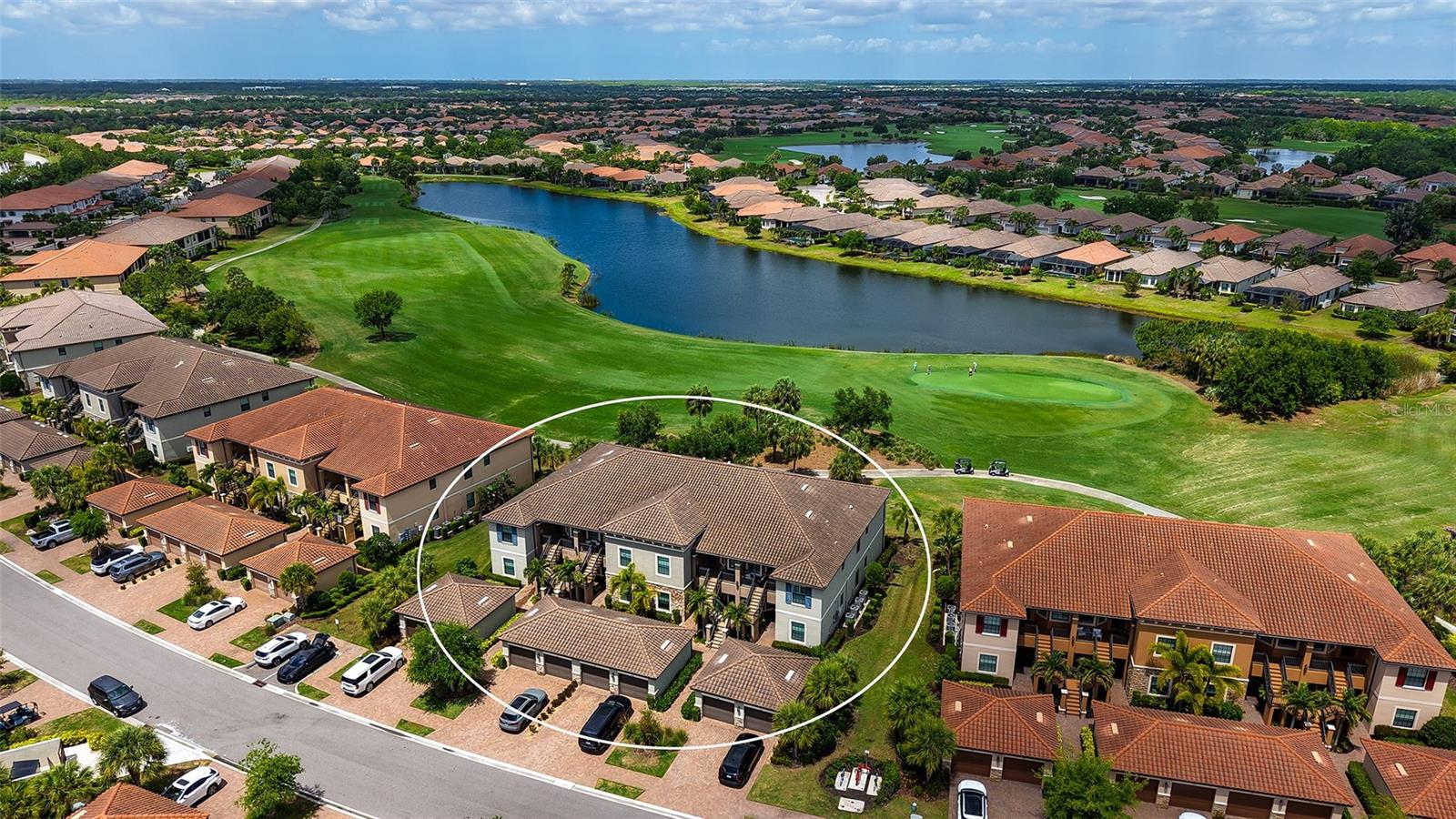 An excellent investment opportunity with a lease already in place, this garden condominium in Esplanade Golf & Country Club offers immediate income in a highly desirable Lakewood Ranch community. This Caserta VII floor plan features two bedrooms, two baths, and a versatile den or flex space, designed with an open-concept layout that appeals to today’s renters and future owners alike. The foyer leads into a spacious dining area and great room, where sliding glass doors open to a covered, screened lanai overlooking tranquil lake and golf course views. The kitchen is thoughtfully appointed with 42-inch cabinetry, granite countertops, and an oversized island that flows seamlessly into the main living areas. The primary suite includes dual vanities, a large walk-in shower, a private water closet, and two generous walk-in closets. A private hallway leads to the guest bedroom and bath, offering comfort and separation for visitors. The residence also includes a one-car detached garage. While this unit does not include a golf membership, residents still enjoy access to Esplanade’s exceptional resort-style amenities set across approximately 600 acres of scenic lakes, preserves, and natural beauty. Amenities include resort-style pools, a resistance pool, fitness centers, sports courts, dining venues, and a full social calendar, all easily accessible by golf cart—delivering the vibrant lifestyle that makes this community so sought after. Lakewood Ranch is the number one best-selling, multigenerational community in the country and located near world-class shopping, dining, entertainment and is minutes to I-75, beaches, great schools and medical facilities.