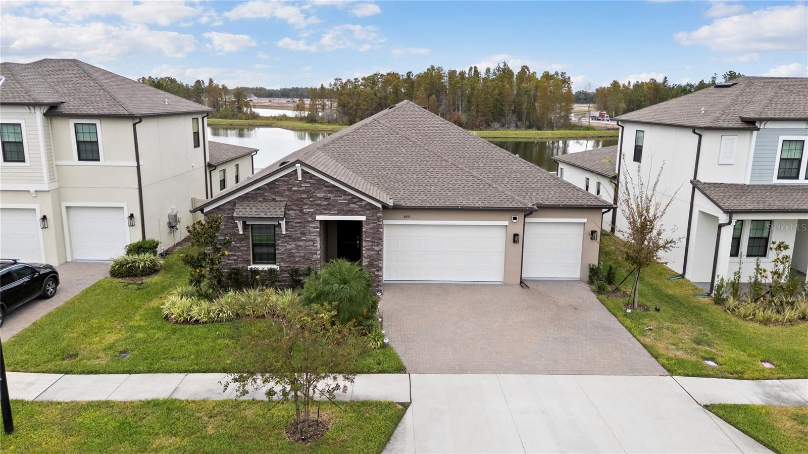**POND VIEW | FENCED YARD | 3-CAR GARAGE | OVER 2,600 SQ FT | PEST CONTROL, WIFI & LAWN CARE INCLUDED | CONNERTON COMMUNITY** Welcome to this truly impressive 4-bedroom, 3-bathroom home located in the highly desirable Connerton community. Offering over 2,600 square feet of well-designed living space, this spacious single-story residence combines comfort, functionality, and style. The open-concept floor plan provides plenty of room for everyday living and entertaining, while large windows showcase beautiful pond views from the rear of the home. The well-appointed kitchen overlooks the main living areas, creating a seamless flow for gatherings with family and friends. A dedicated laundry room adds convenience, and the oversized 3-car garage provides ample space for vehicles, storage, hobbies, or recreational equipment. The generous primary suite offers a private retreat, while the additional bedrooms and bathrooms are thoughtfully positioned to accommodate family members or guests. Step outside to enjoy the fully fenced backyard, where peaceful water views create the perfect setting for relaxing mornings or evening sunsets. Pest control, WiFi, and lawn care are included, adding value and convenience to your everyday living experience. Situated within the sought-after Connerton community, residents enjoy access to exceptional amenities, scenic walking trails, parks, community events, and convenient access to shopping, dining, schools, and major roadways. This is a home that truly stands out for its size, setting, and overall appeal. Don't miss your opportunity to make it yours!
