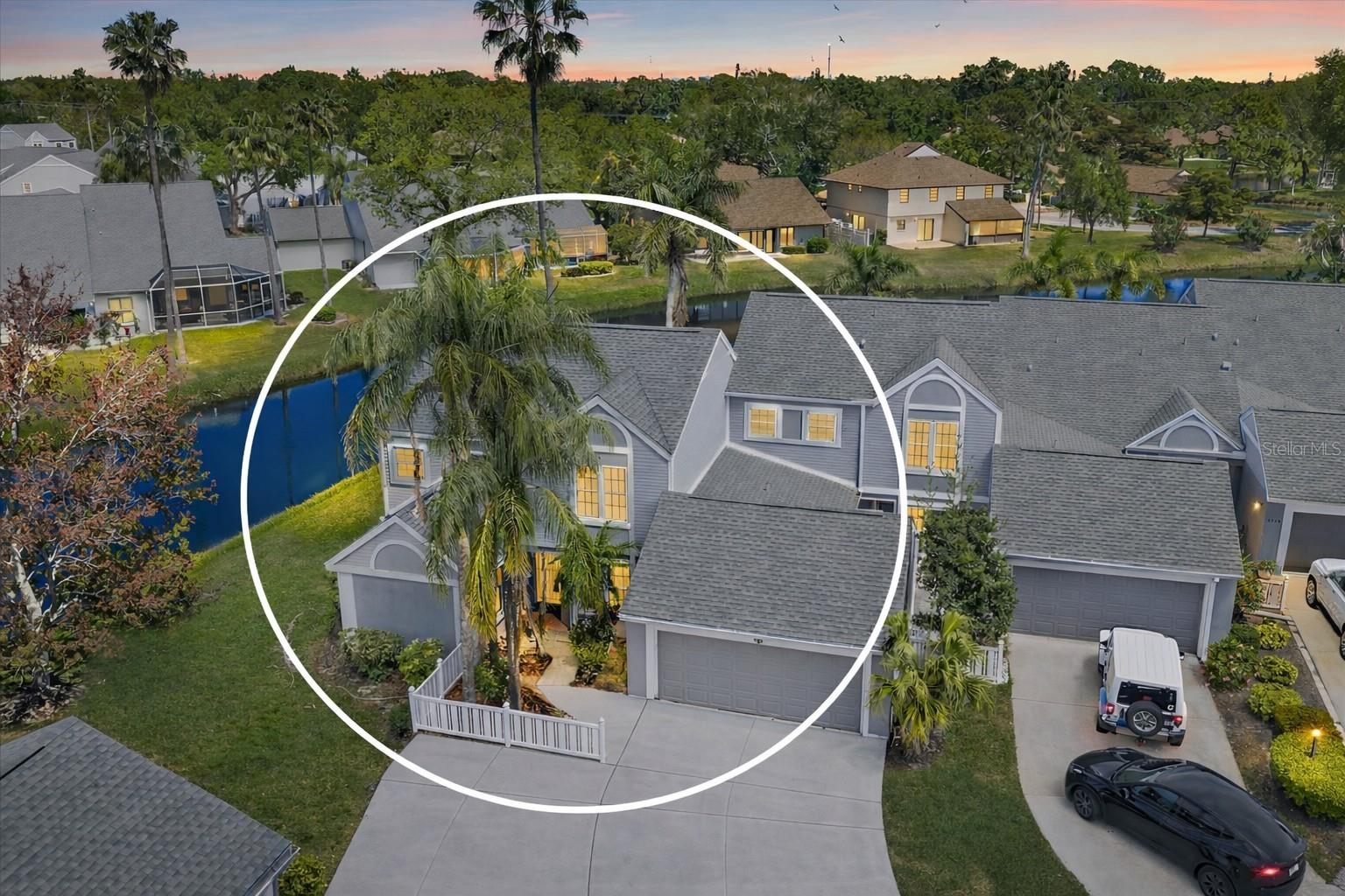 One or more photo(s) has been virtually staged. LIVE ON VACATION NOW IN one of the largest condos in Southwinds at Five Lakes, offering exceptional space and a flexible layout ready for you to make your own. This expansive 3-bedroom, 3-bath residence PLUS LOFT is thoughtfully designed for both comfortable living and effortless entertaining. VAULTED CEILINGS and HURRICANE IMPACT WINDOWS fill the home with natural light, while the oversized living and dining areas create a seamless, open flow.

A PRIVATE GUEST SUITE provides ideal separation for visitors, while tranquil POND VIEWS create a peaceful setting. With generous square footage throughout, there is ample opportunity to personalize and truly make this home your own. Enjoy the ease of MAINTENANCE-FREE living, with ADDITIONAL PARKING available for added convenience.

Southwinds at Five Lakes offers beautifully maintained grounds and a well-appointed amenity package, including a community pool, clubhouse, pickleball, and tennis courts. The location is exceptional—just a short 8-mile drive to Anna Maria Island, allowing you to enjoy the Gulf beaches with ease, while also being close to University Town Center, known for its world-class dining and shopping, and minutes from IMG Academy.

The maintenance fee provides outstanding value, covering cable, internet, exterior building maintenance, pool and common grounds care, lawn service, irrigation, pest control, and roofing. Residents also enjoy resort-style amenities featuring two sparkling pools along with pickleball and tennis courts, shuffleboard, and convenient RV or boat trailer parking available for a nominal fee.

Take advantage of this rare opportunity to own a spacious, well-located condo in one of the area’s most desirable communities. What are you waiting for? Life is not a dress rehearsal, LIVE ON VACATION NOW!