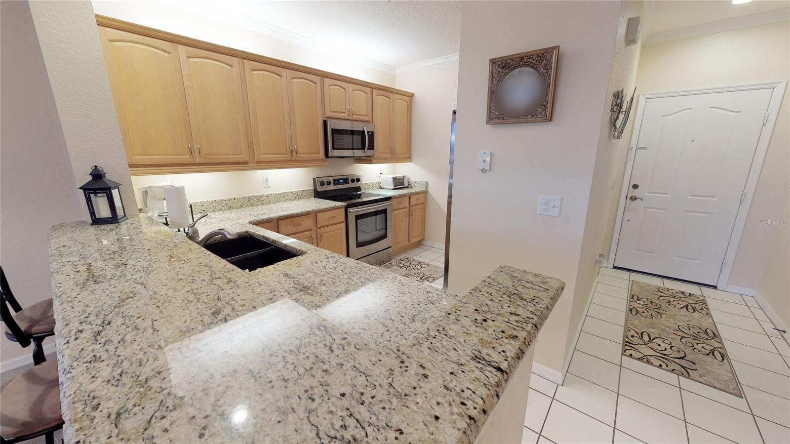 This 2 bedroom 2 bathroom Bouchelle Island unit offers an open floor plan, high ceilings, granite counter tops, stainless steel appliances, concrete construction, hurricane shutters, not to mention the breath taking view of the river and N. Causeway. This unit also comes with a  1 car covered parking space #33, with extra storage.  Bouchelle Island is centrally located and convenient to everything. Boat slips are available first come, first serve. Unit is being offered furnished including electronics (excluding any rented equipment provide by cable provider.) All measurements are estimated and should be verified for accuracy. ;Water: City