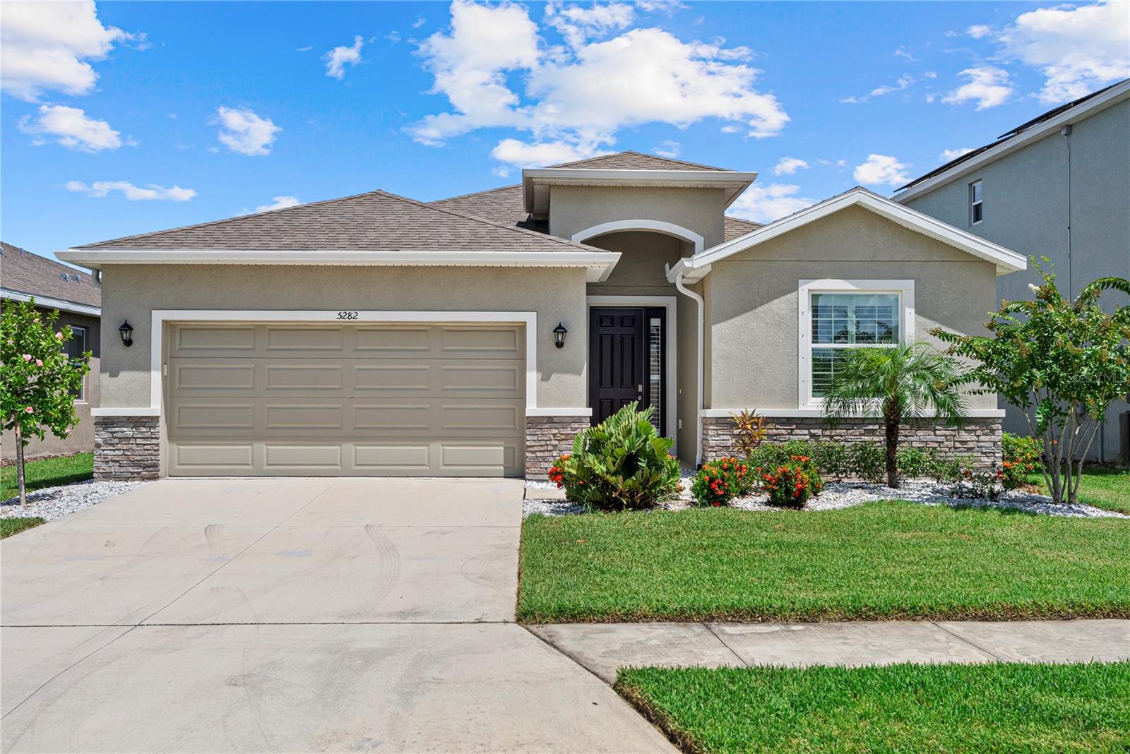 Experience refined Lakewood Ranch living at 5282 Grove Mill Loop, where timeless design meets modern convenience in the prestigious Solera community. This 4-bedroom, 2.5-bath residence showcases a thoughtfully crafted open floor plan, enhanced by plantation shutters, soft natural light, and a seamless flow that invites both relaxation and entertaining.

The chef’s kitchen opens gracefully to the dining and living areas, creating an ideal space for hosting memorable gatherings. The spacious primary bedroom offers a serene retreat, while additional bedrooms provide comfort and versatility for family or guests.

Premium upgrades include garage door insulation for year-round efficiency, a deep utility sink in the garage, solar-powered outdoor water softener, and a screened-in patio with ceiling fan - perfect for enjoying Florida evenings in comfort. The fully fenced backyard offers privacy and space for outdoor enjoyment.

Set within Solera, residents enjoy resort-style amenities including a sparkling pool, playgrounds for kids to play and proximity to Lakewood Ranch’s premier dining, shopping, and top-rated schools.

This is more than a home—it’s a statement of style, comfort, and the art of Florida living.
Take advantage of sellers' assumable loan with 4.75% interest rate!