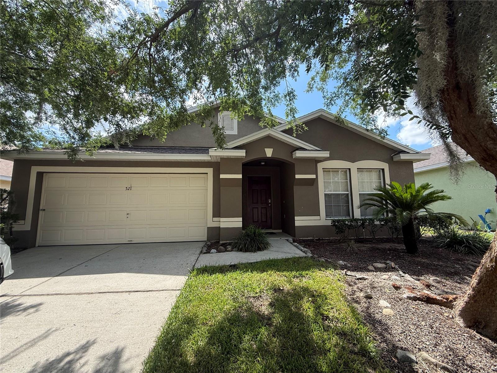 Welcome to this beautifully maintained 4-bedroom, 2-bath pool home located in the desirable Hampton Estates community of Davenport. Whether you’re searching for a primary residence, vacation retreat, or investment opportunity, this home offers the perfect blend of comfort and Florida living. Step inside to discover an open-concept layout featuring a spacious living and dining area, vaulted ceilings, tile flooring throughout the main living spaces, and abundant natural light. The kitchen overlooks the living area and offers ample cabinet space, making it ideal for entertaining.

The private owner’s suite features direct access to the screened lanai, a large walk-in closet, and an en-suite bath with dual sinks, a soaking tub, and separate shower. Enjoy year-round outdoor living in your screen-enclosed pool area, complete with a covered lanai and no rear neighbors, providing added privacy and a peaceful setting surrounded by mature landscaping.

Conveniently located near major highways, shopping, dining, golf courses, and Central Florida’s world-famous attractions, this property offers the best of both relaxation and accessibility. Don’t miss your opportunity to own this inviting Florida pool home—schedule your private showing today!