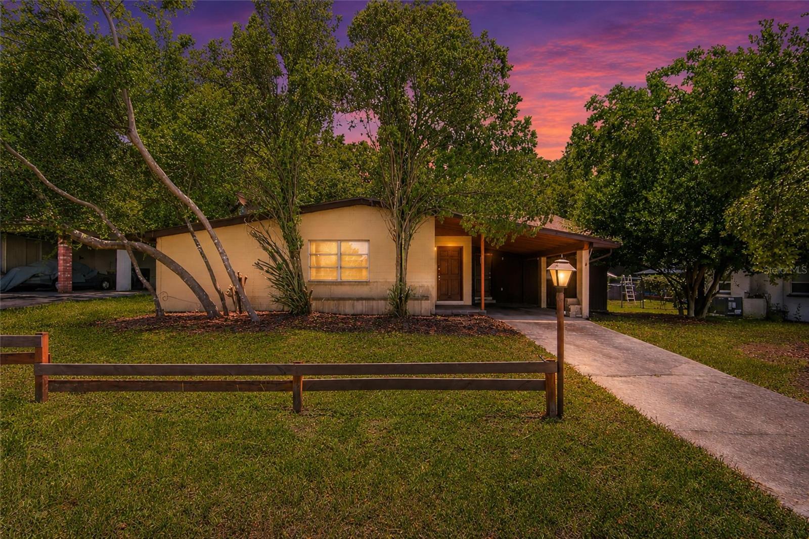 Step back in time with this charming, original-owner mid-century gem that perfectly blends vintage character with modern potential. Built in 1962 and thoughtfully expanded in 1986, this spacious 2,200-square-foot home preserves its most desirable retro features, including gorgeous original terrazzo flooring, rich wood paneling, and iconic turquoise appliances. With a little imagination and some tender loving care, this unique property can easily transform into a sparkling masterpiece. The clever addition creates an ideal split-floor plan that offers incredible layout versatility. The original wing of the house features three comfortable bedrooms, a full bathroom, a cozy kitchen, and an inviting family-dining combo. The expanded side hosts two additional bedrooms, a second full bath, a formal dining room, a dedicated laundry area, and a flexible bonus space perfect for an office or playroom. Major peace of mind comes built-in thanks to a new roof installed in 2022, while the backyard offers a large, practical storage shed. Location is everything, and this home places you minutes from the best of Clermont. Enjoy quick access to Cypress Ridge Elementary, Aurelia Cole K-8, Downtown Clermont, Waterfront Park, and scenic Lake Minneola. Commuting is also effortless with nearby access to both Highway 50 and Highway 27.