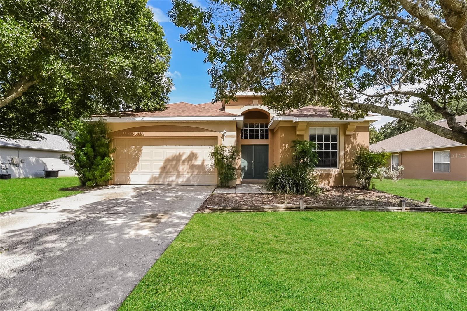 Charm and curb appeal abound for this Debary home! Step inside the inviting foyer and into the well-appointed living room, positioned in the center of the home. The kitchen boasts chic black appliances, hard surface countertops, and ample storage. The primary suite and two secondary bedrooms round out this ranch style floorplan. Come and see the possibilities that this home has to offer!
