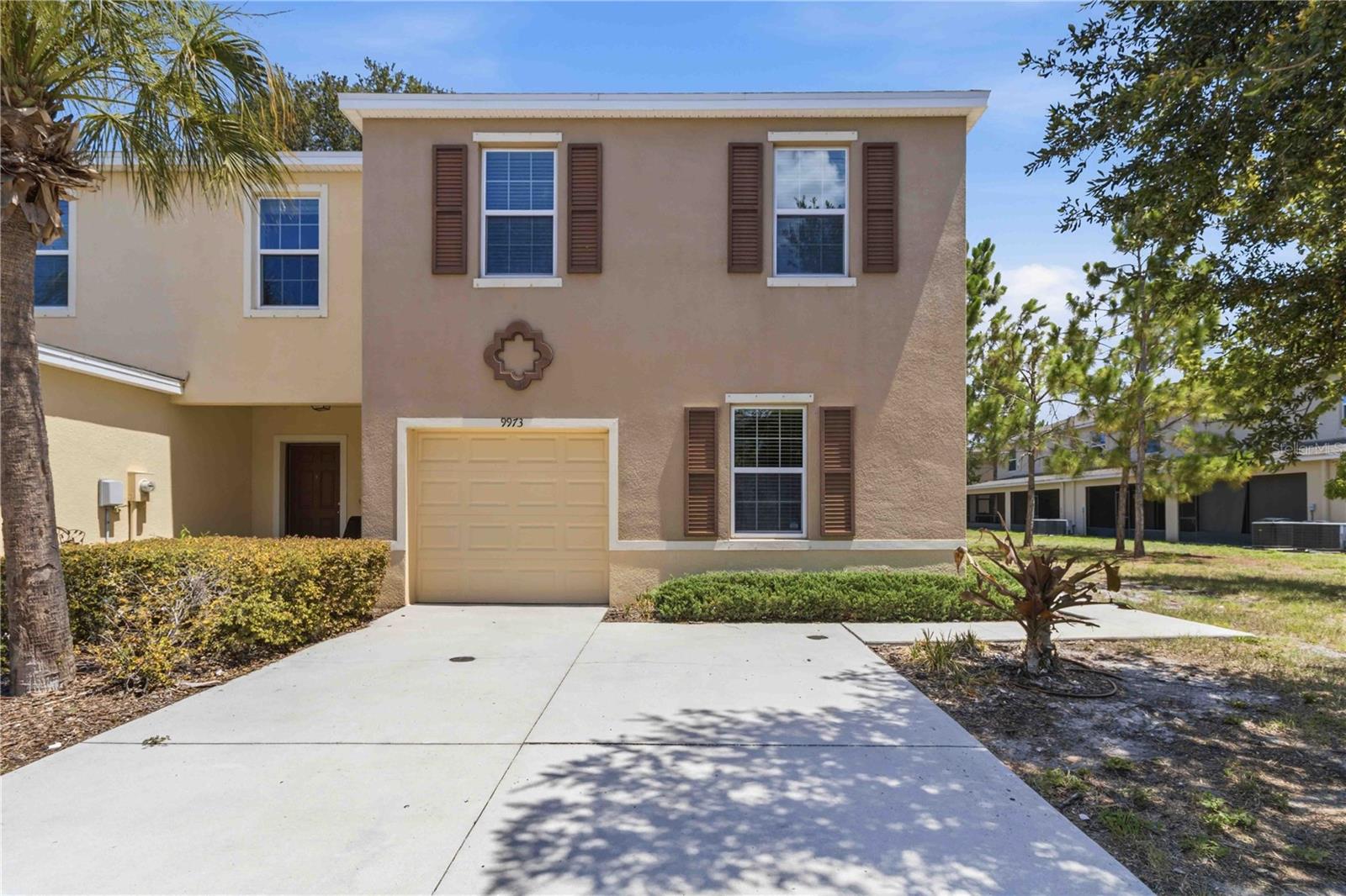 Welcome to this spacious and beautifully designed 1,684-square-foot townhome located in the highly desirable Copper Creek community of Gibsonton. Built in 2018, this 3 bedroom, 2 1/2 bathroom, 1 car garage residence perfectly blends the effortless convenience of townhome living with the spacious, open feel of a single-family home.
From the moment you arrive, you will notice the home’s charming curb appeal, featuring a classic Mediterranean-inspired stucco exterior, a private concrete driveway, and an attached one-car garage. Step inside to discover an expansive first-floor living space highlighted by modern, low-maintenance wood-look flooring and brilliant natural light pouring in through large windows and sliding glass doors. The open-concept layout seamlessly flows into a contemporary kitchen that is perfect for home chefs. It comes fully equipped with stylish dark cabinetry, crisp white and gray quartz countertops, a deep under-mount stainless steel sink, and a large breakfast bar that opens to the living area. All essential appliances are included for your convenience, featuring an electric range, built-in microwave, dishwasher, and refrigerator.
Just off the living area, you can step out onto an oversized, fully screened-in covered back patio to enjoy your morning coffee or evening relaxation while overlooking a peaceful, tree-lined green space. Upstairs, the private quarters feature soft, plush carpeting throughout the bedrooms. The expansive primary suite serves as a relaxing retreat, complete with a massive walk-in closet and an updated en-suite bathroom featuring a modern double-sink vanity with sleek white countertops. A second full bathroom upstairs features a clean tub/shower combination, and a dedicated interior laundry closet comes fully equipped with an included washer and dryer to handle your daily needs with ease.
This exceptional property is available for a 12-month lease with a move-in date starting immediately. To make your living experience even more seamless, the monthly rent includes water, sewer, and trash collection services. Please note that this is a non-smoking property and pets are not allowed. There is a $75.00 application fee per adult applicant. This property is zoned for Corr Elementary, Eisenhower Middle, and East Bay High School. Showings are available by appointment only. Call to schedule your private tour!
Fees: Applicant Fee $75pp; Condo Application Fee $100pp; Tenant Processing Fee $100pp; $45/mo per unit covers the Tenant Benefit Package (includes positive-only credit reporting, renter’s insurance, identity theft protection, move-in concierge, and air filters). Tenants to https://suncoastpms.myintellirent.com/?invitetype=1&org=2CE0F63F  (Some photos virtually staged.)